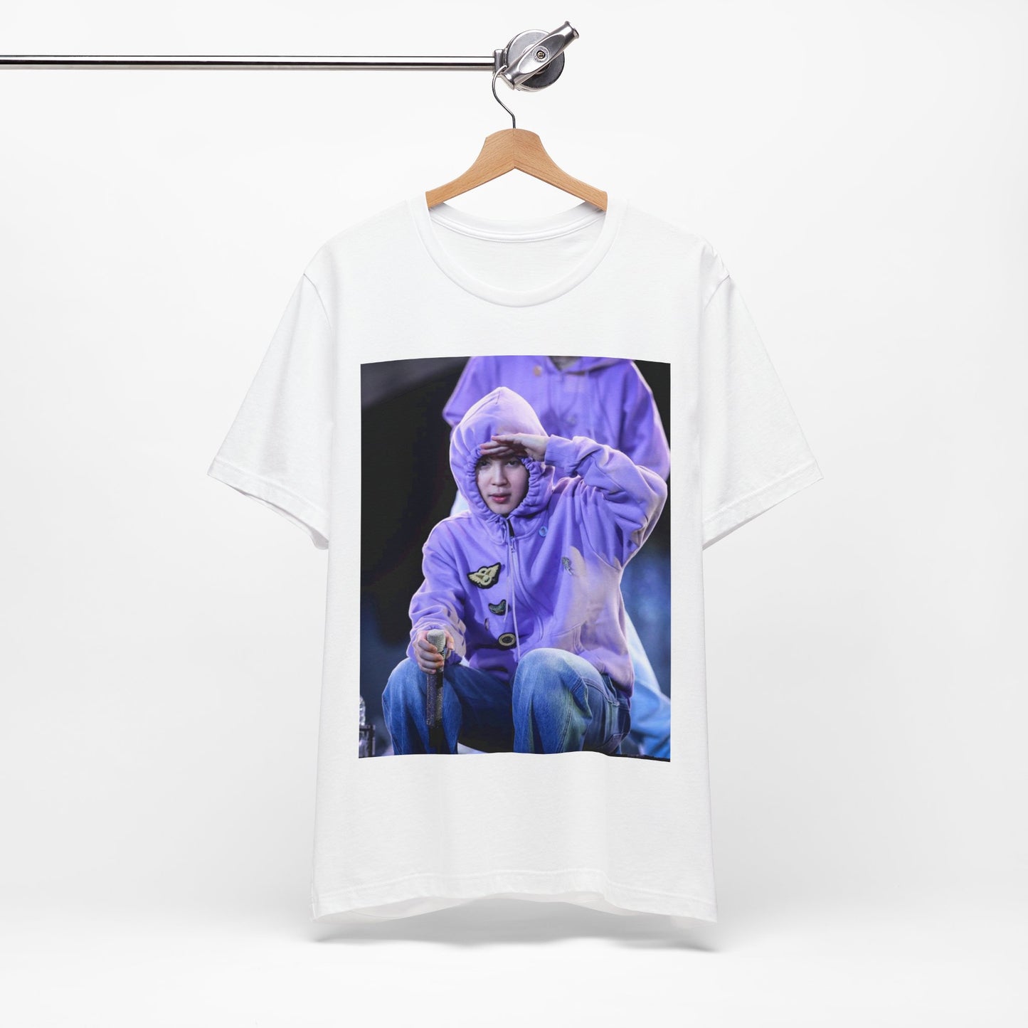 A black graphic t-shirt featuring an authentic live performance graphic of Jimin.