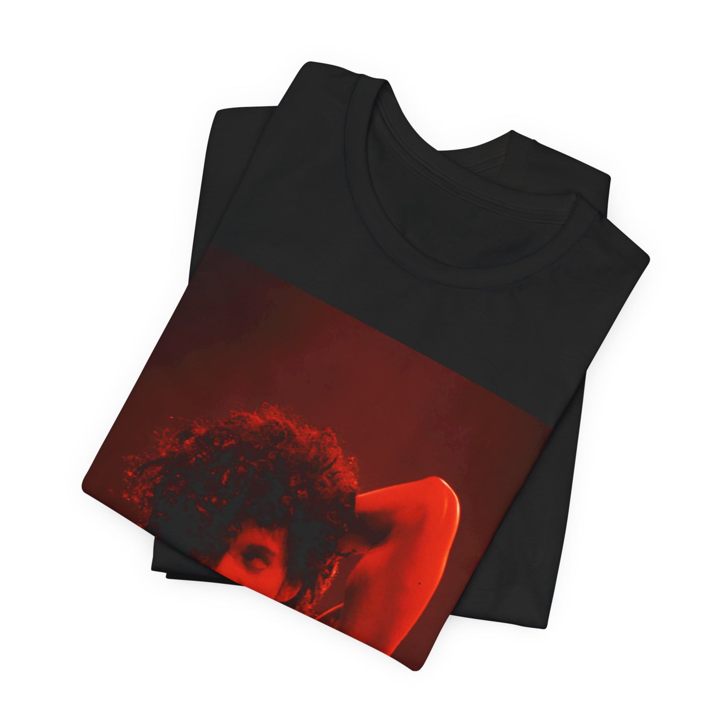 A black graphic t-shirt featuring a concert pop fan graphic of Prince.