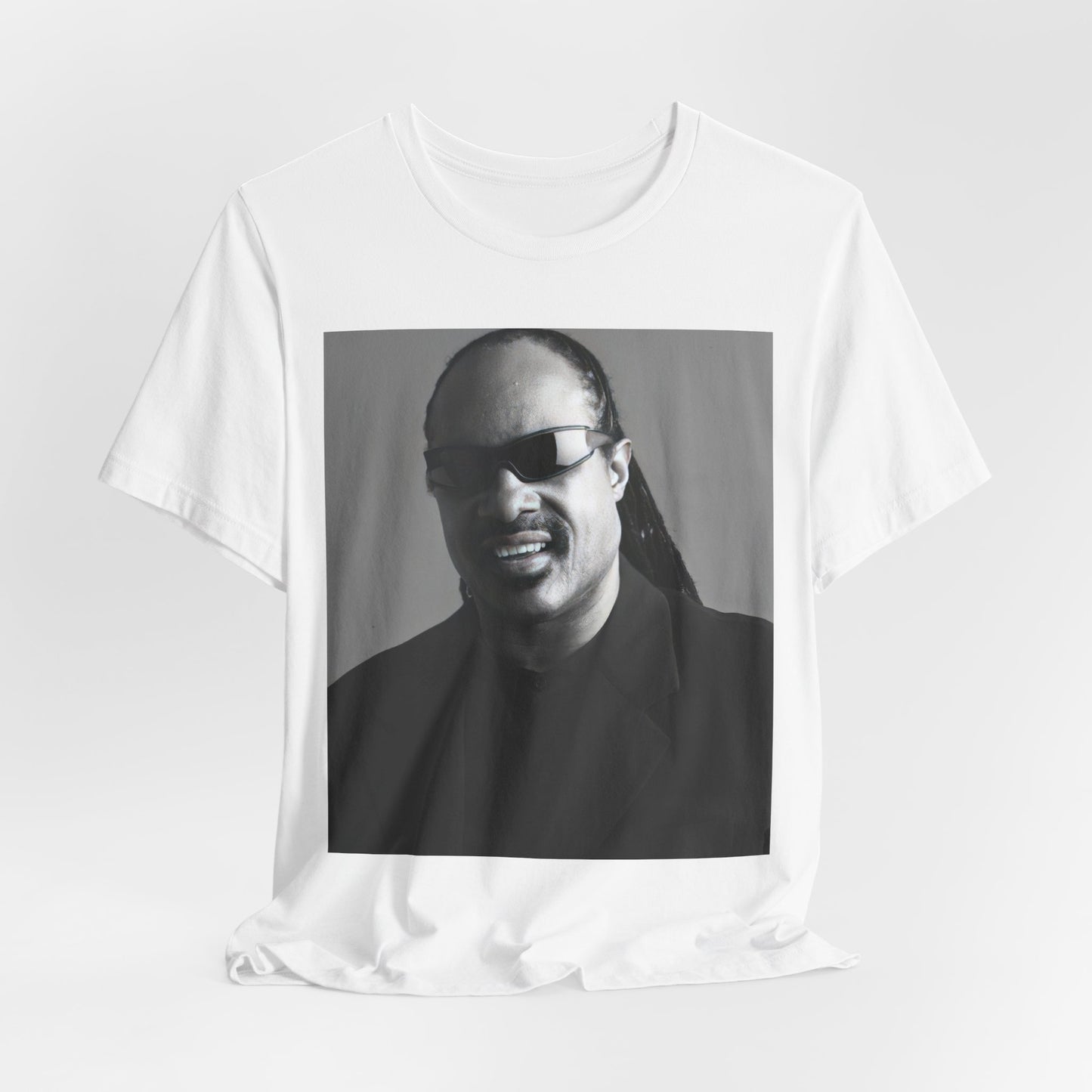A black graphic t-shirt featuring a classic Motown legend black and white graphic of Stevie Wonder.
