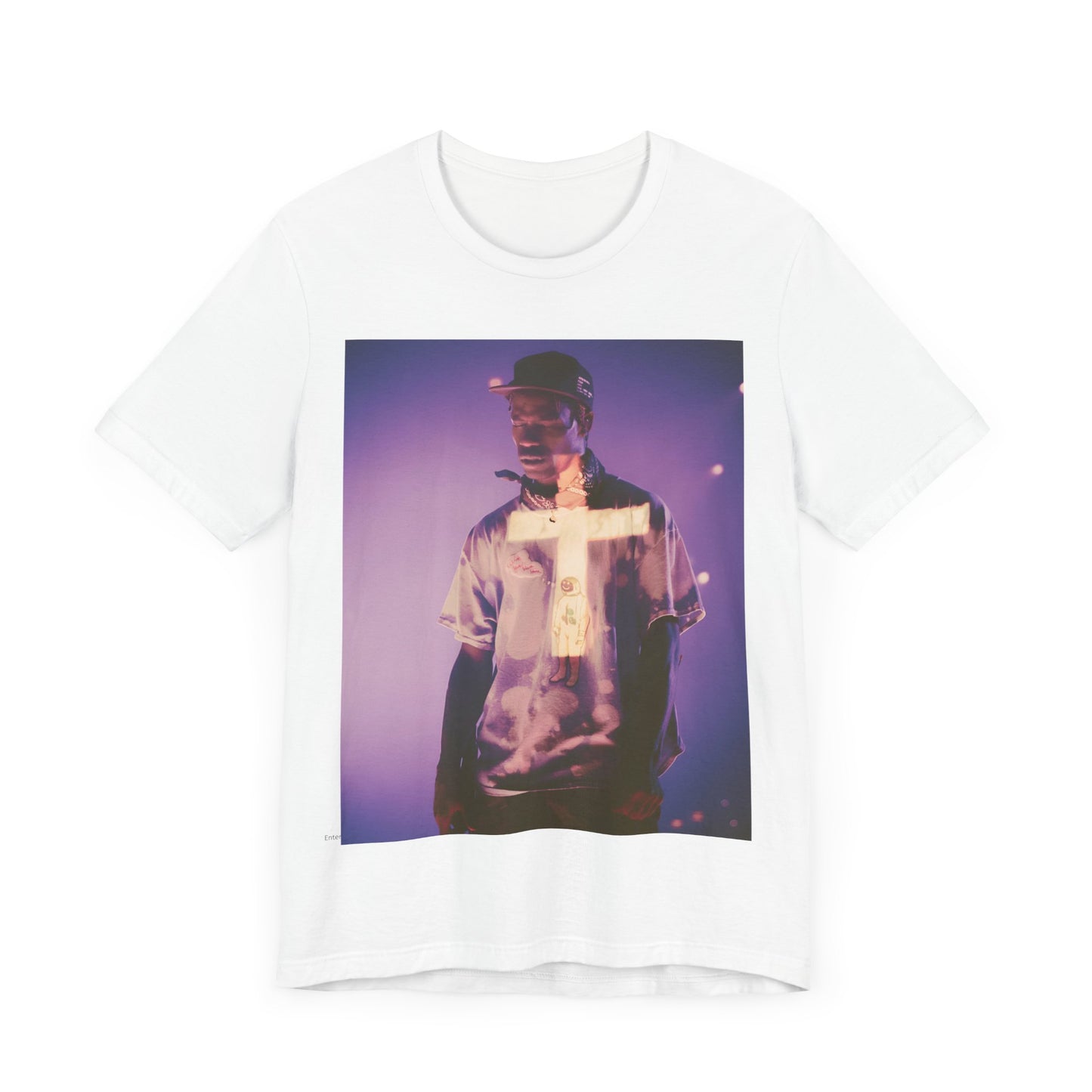 A black graphic t-shirt featuring a graphic of Travis Scott with dark fantasy vibes.