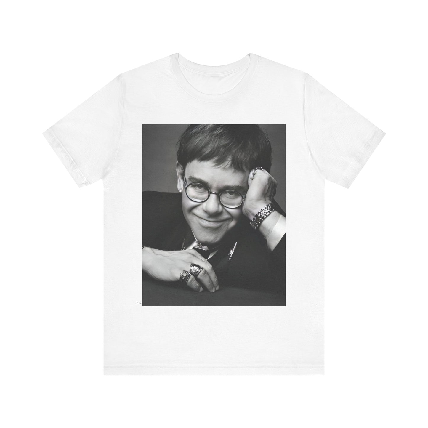 A black graphic t-shirt featuring a retro black and white photo portrait of Elton John.