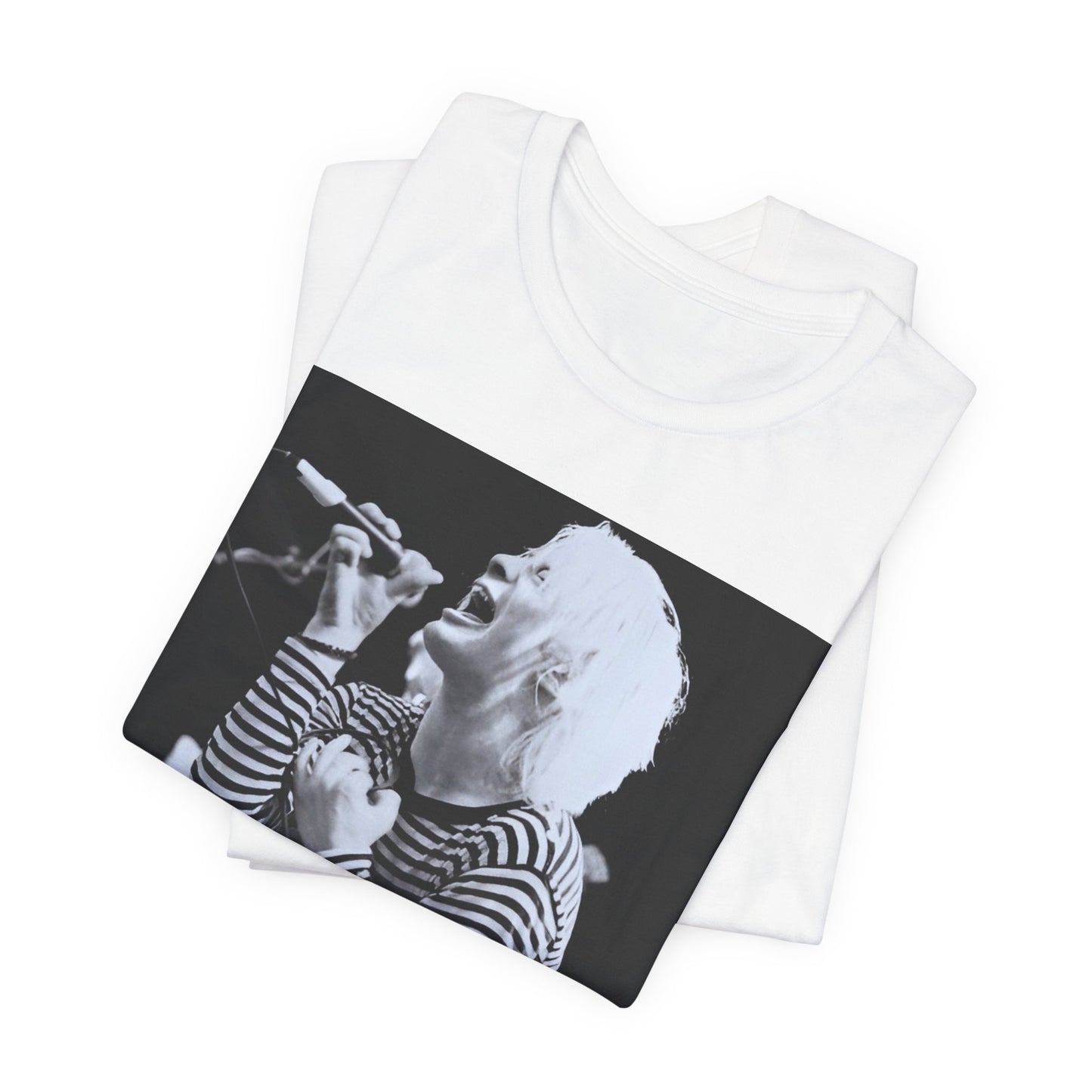 A black graphic t-shirt featuring a black and white graphic or photo of Radiohead performing live.