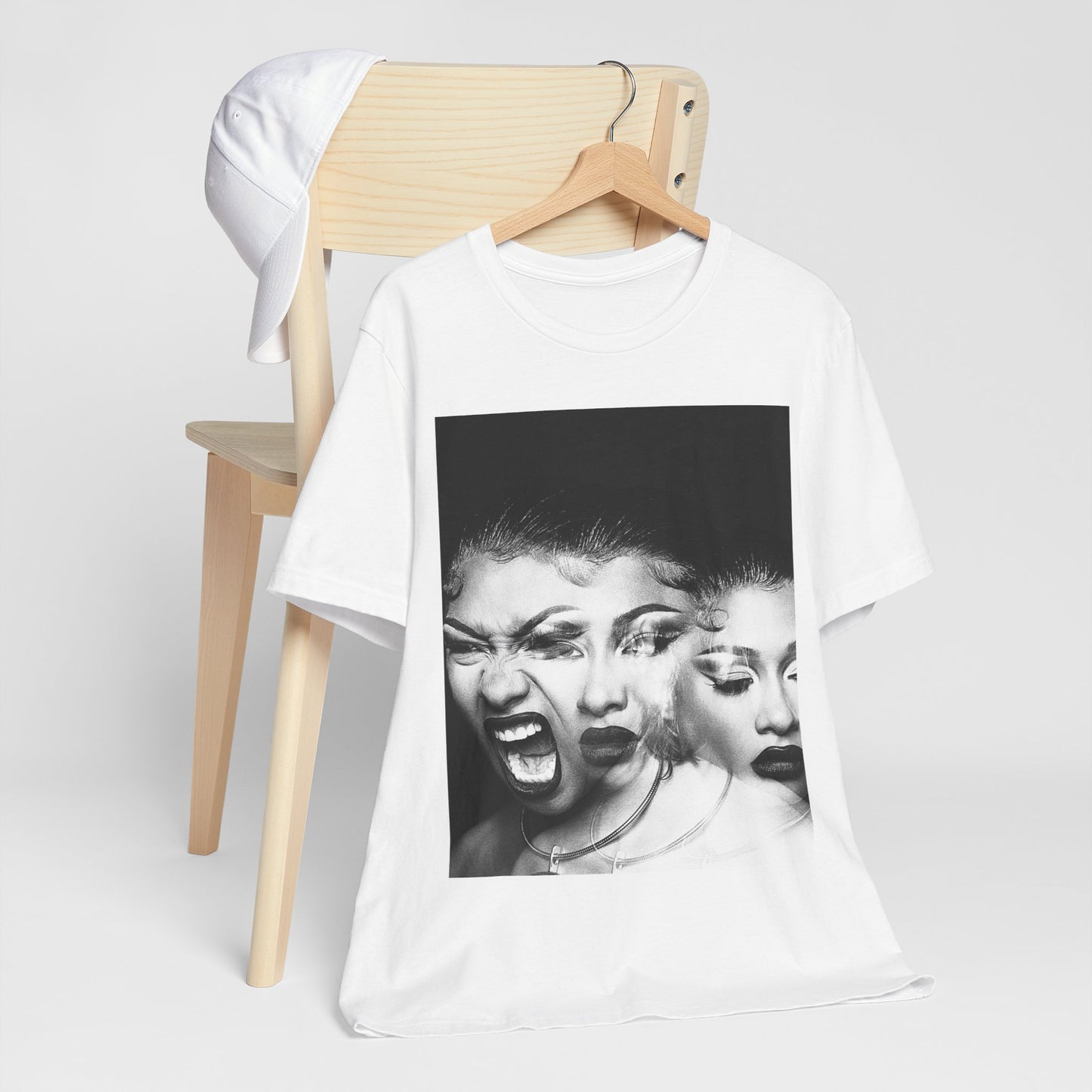 A black graphic t-shirt featuring a graphic related to Megan Thee Stallion's 'Traumazine' album.