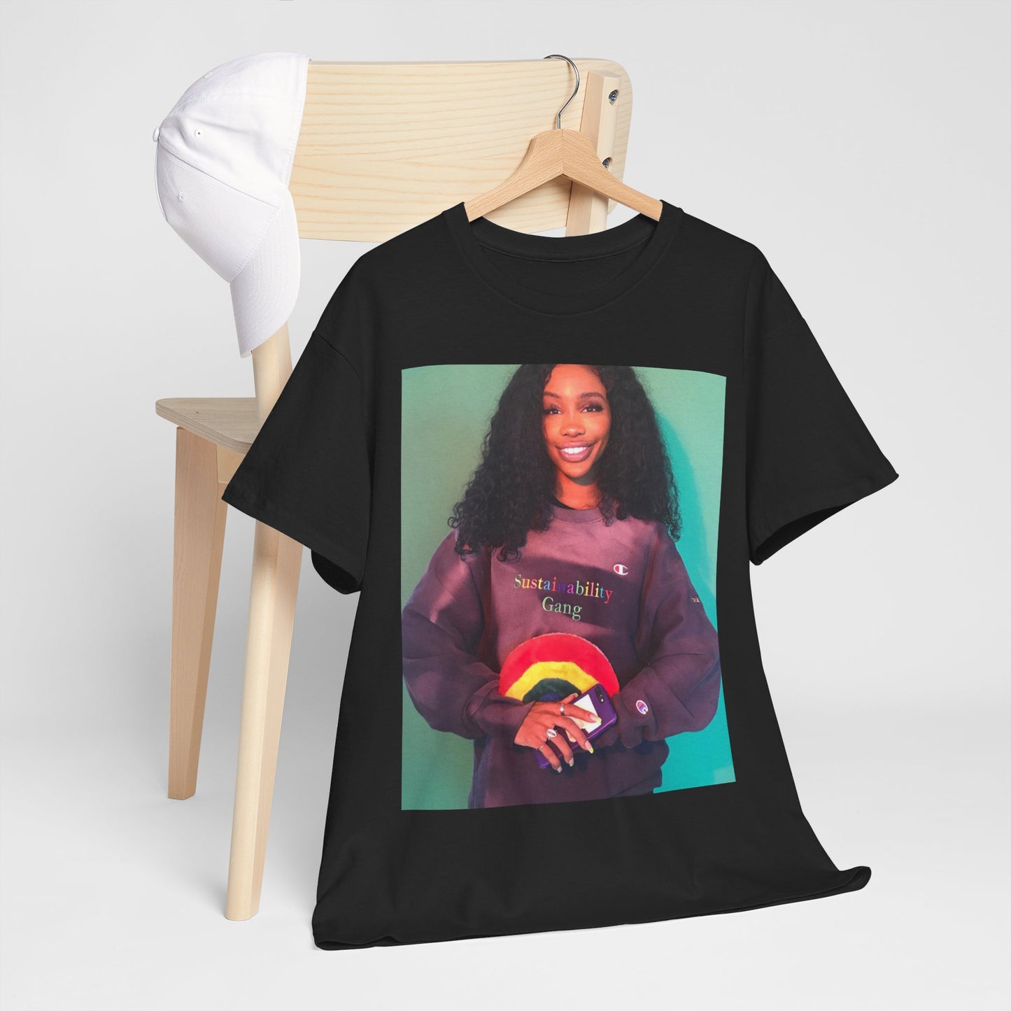 A black graphic t-shirt featuring a graphic of SZA with a feel-good R&B vibe.