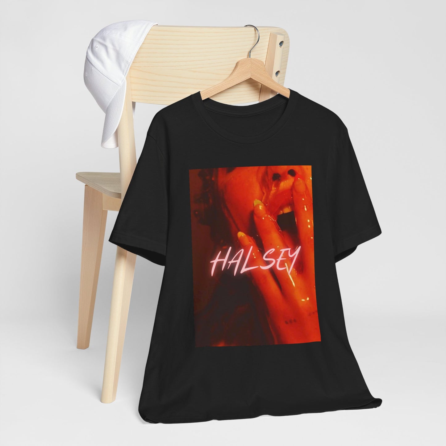 A black graphic t-shirt featuring a retro graphic related to Halsey's 'Without Me' song or era.