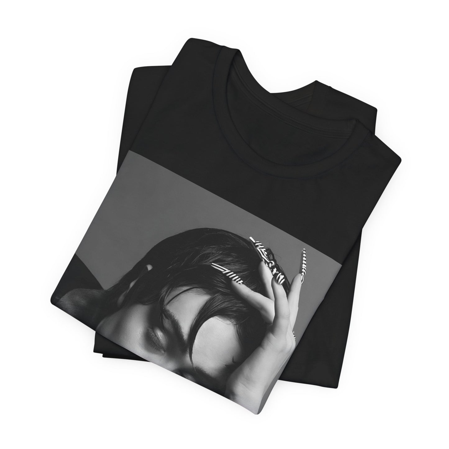 A black graphic t-shirt featuring a black and white graphic of Chappell Roan as a queer pop icon.
