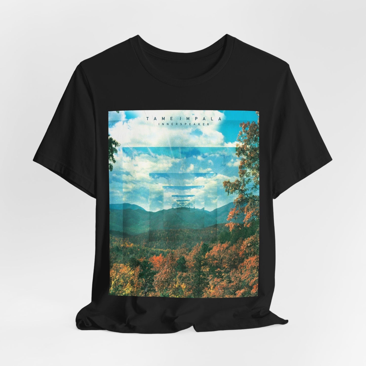 A black graphic t-shirt featuring a graphic related to Tame Impala's 'InnerSpeaker' album.