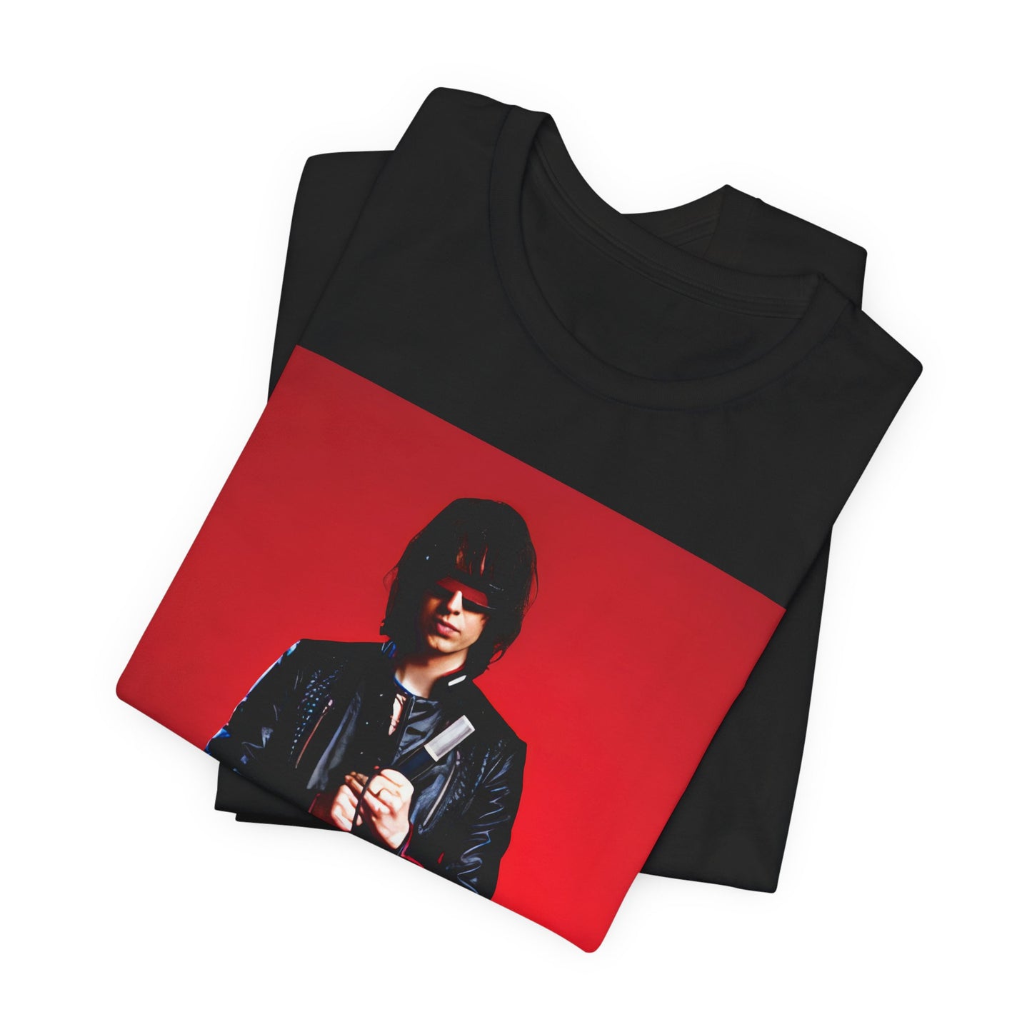 A black graphic t-shirt featuring a bold indie rock superstar graphic of The Strokes.
