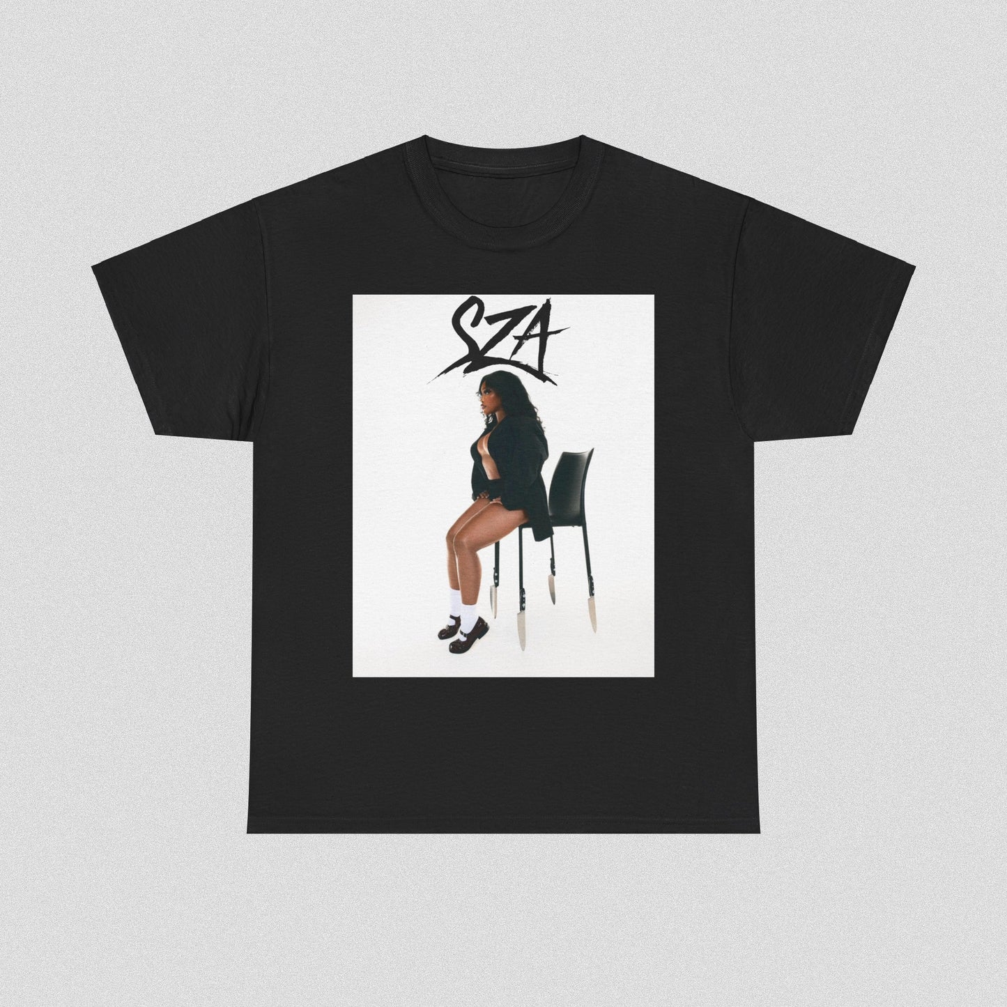 A black graphic t-shirt featuring a chill neo-soul aesthetic graphic of SZA.