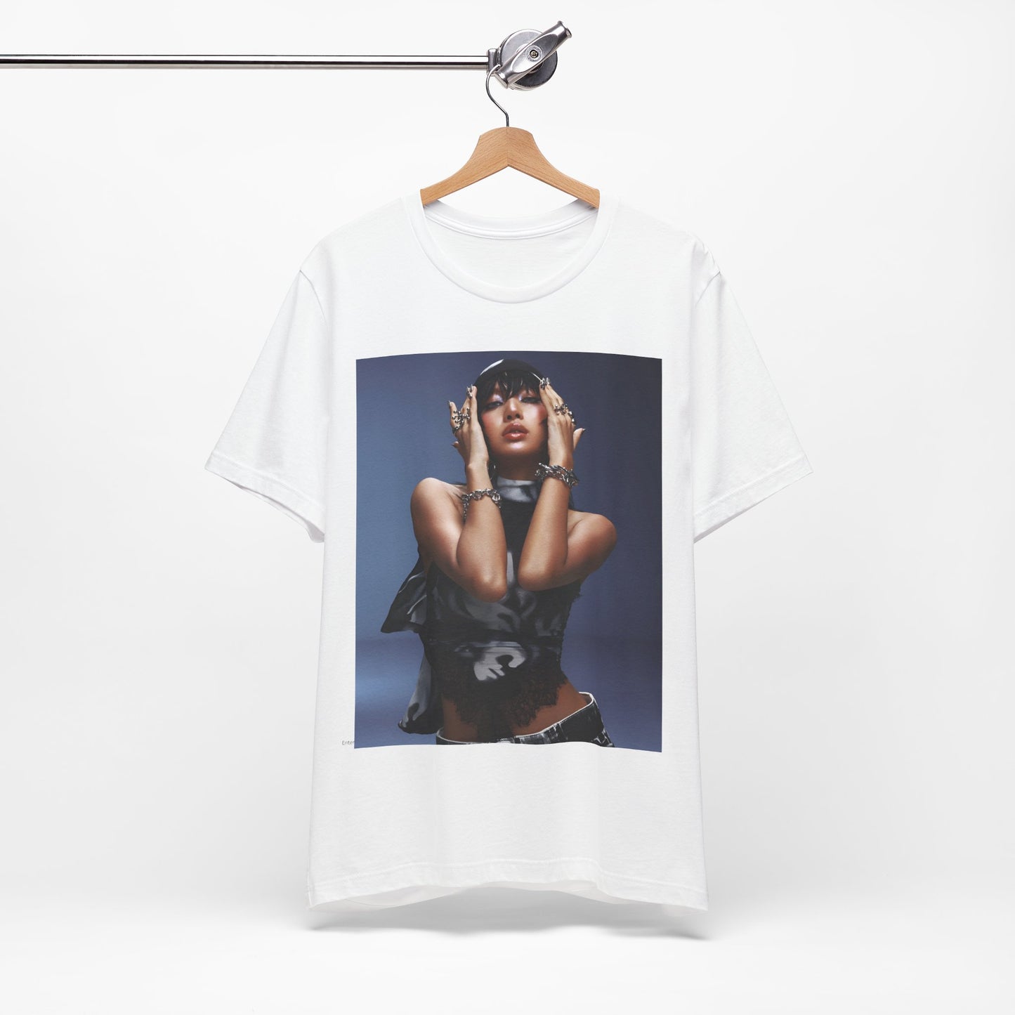 A black graphic t-shirt featuring a bold visual graphic of Lisa from K-Pop.
