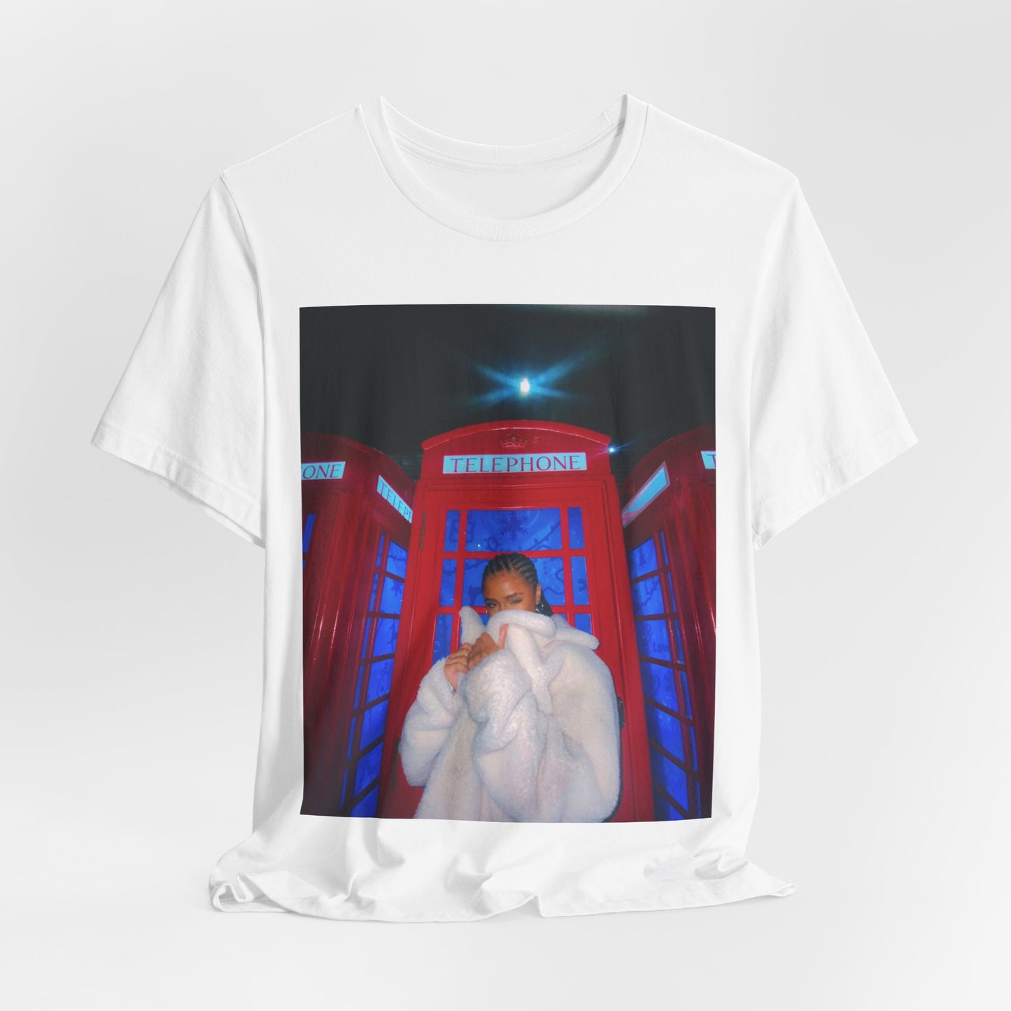 A black graphic t-shirt featuring a rhythmic dance pop graphic of Tyla.