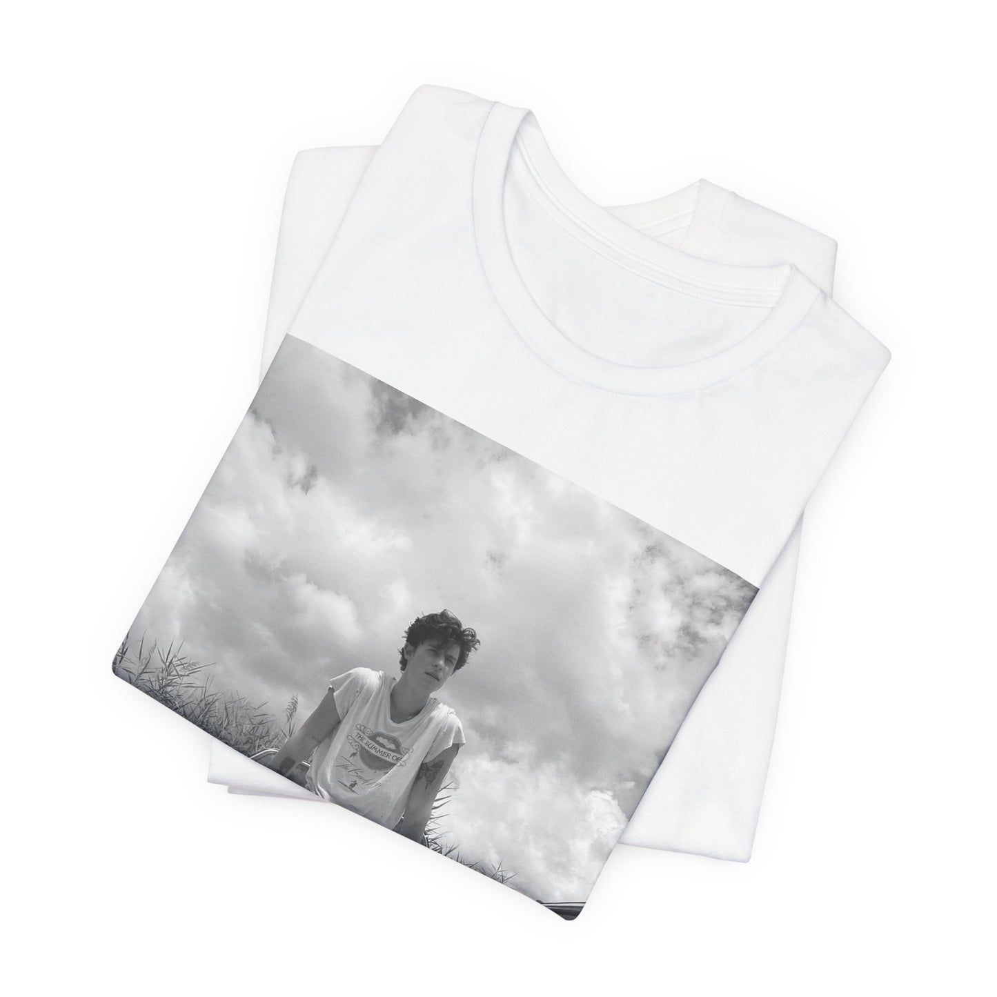 A black graphic t-shirt featuring a graphic of Shawn Mendes in an iconic tank top look.