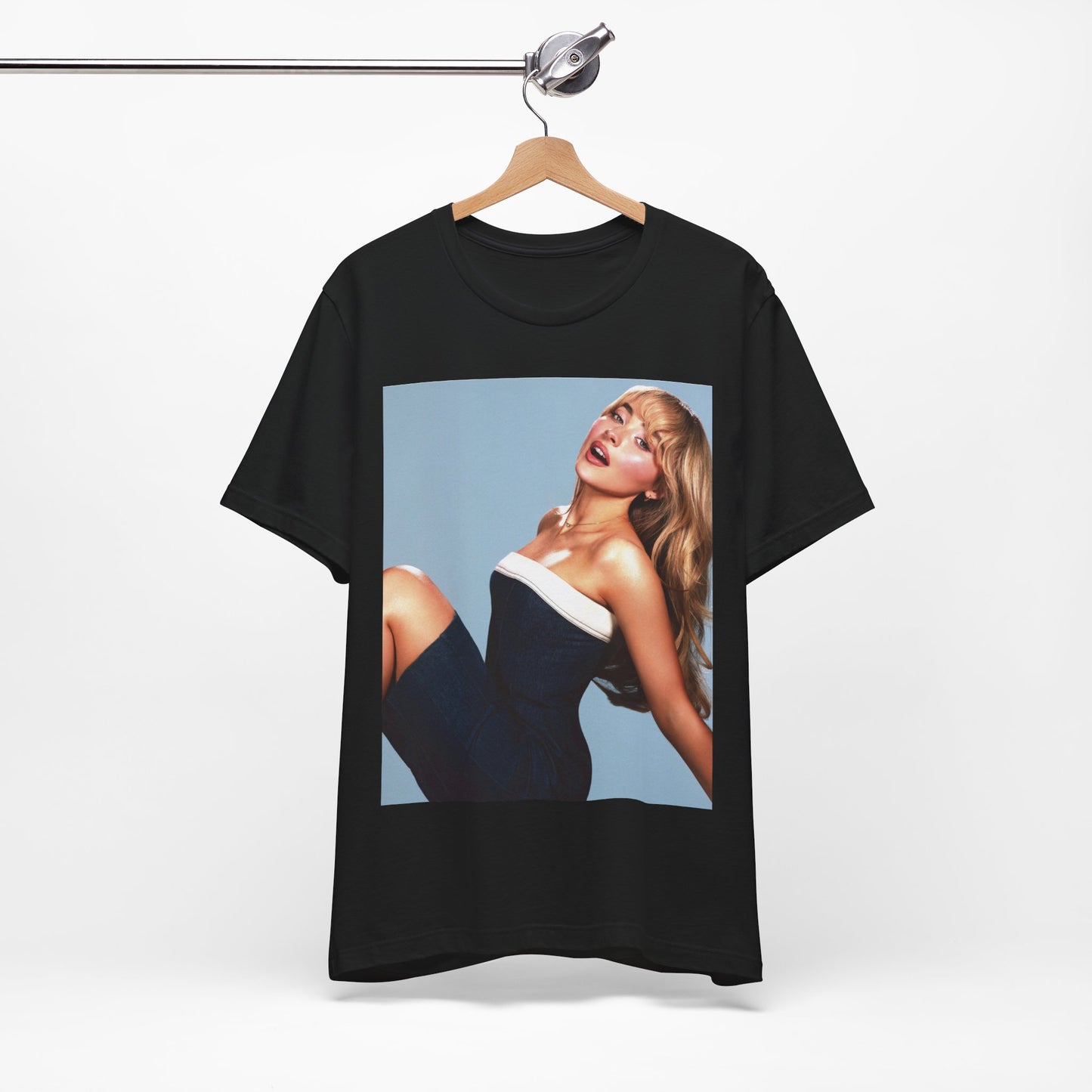 A black graphic t-shirt featuring a graphic related to Sabrina Carpenter's 'Espresso' song or era.