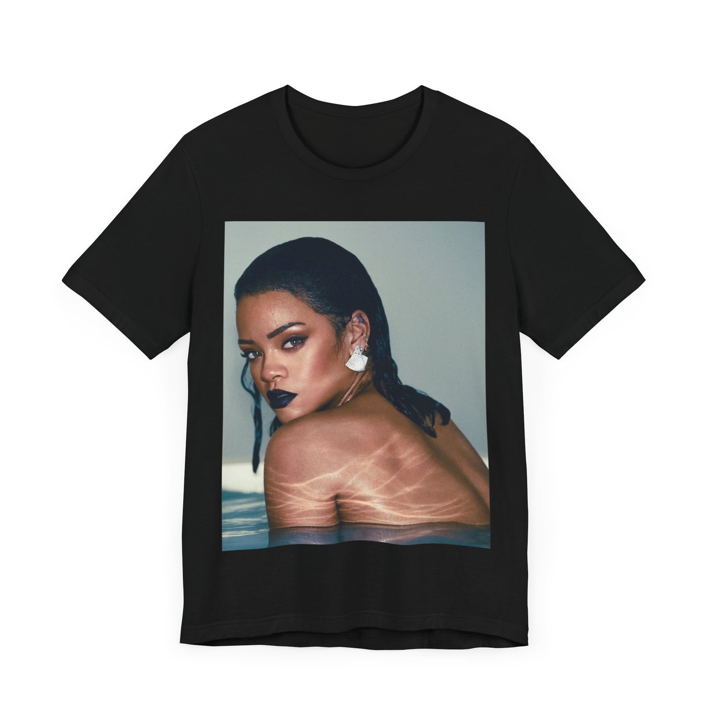 A black graphic t-shirt featuring a vintage pop icon graphic of Rihanna.