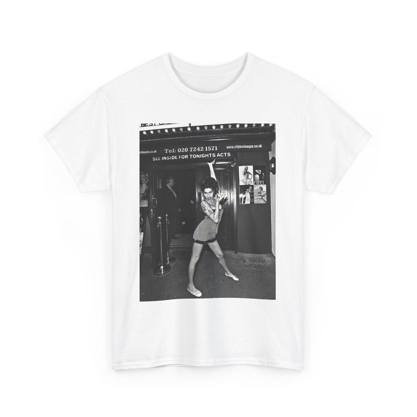 A black graphic t-shirt featuring a black and white graphic of Amy Winehouse in a burlesque club setting, stylized to evoke that ambiance.