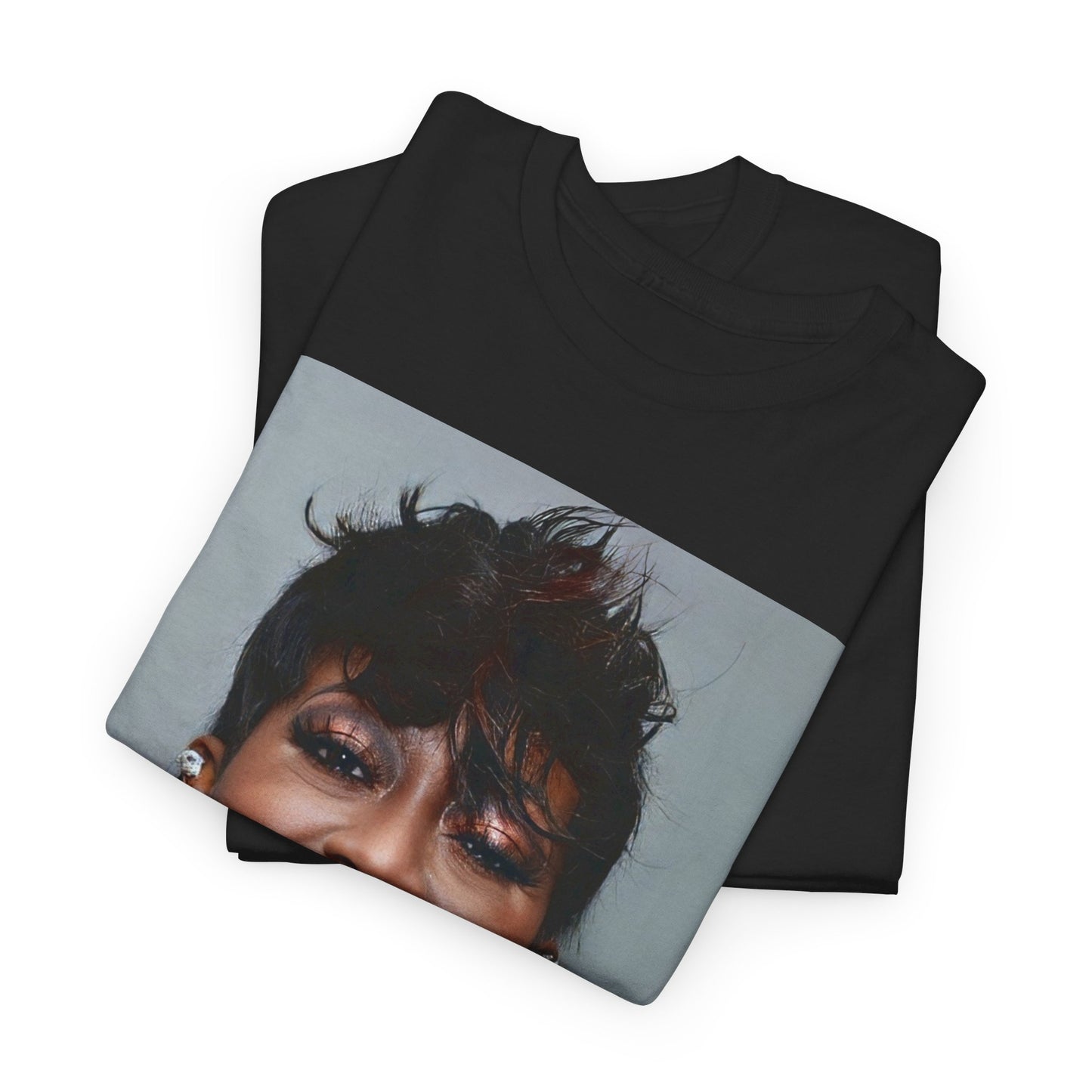 A black graphic t-shirt featuring a bold graphic of Missy Elliott as a rap superstar.