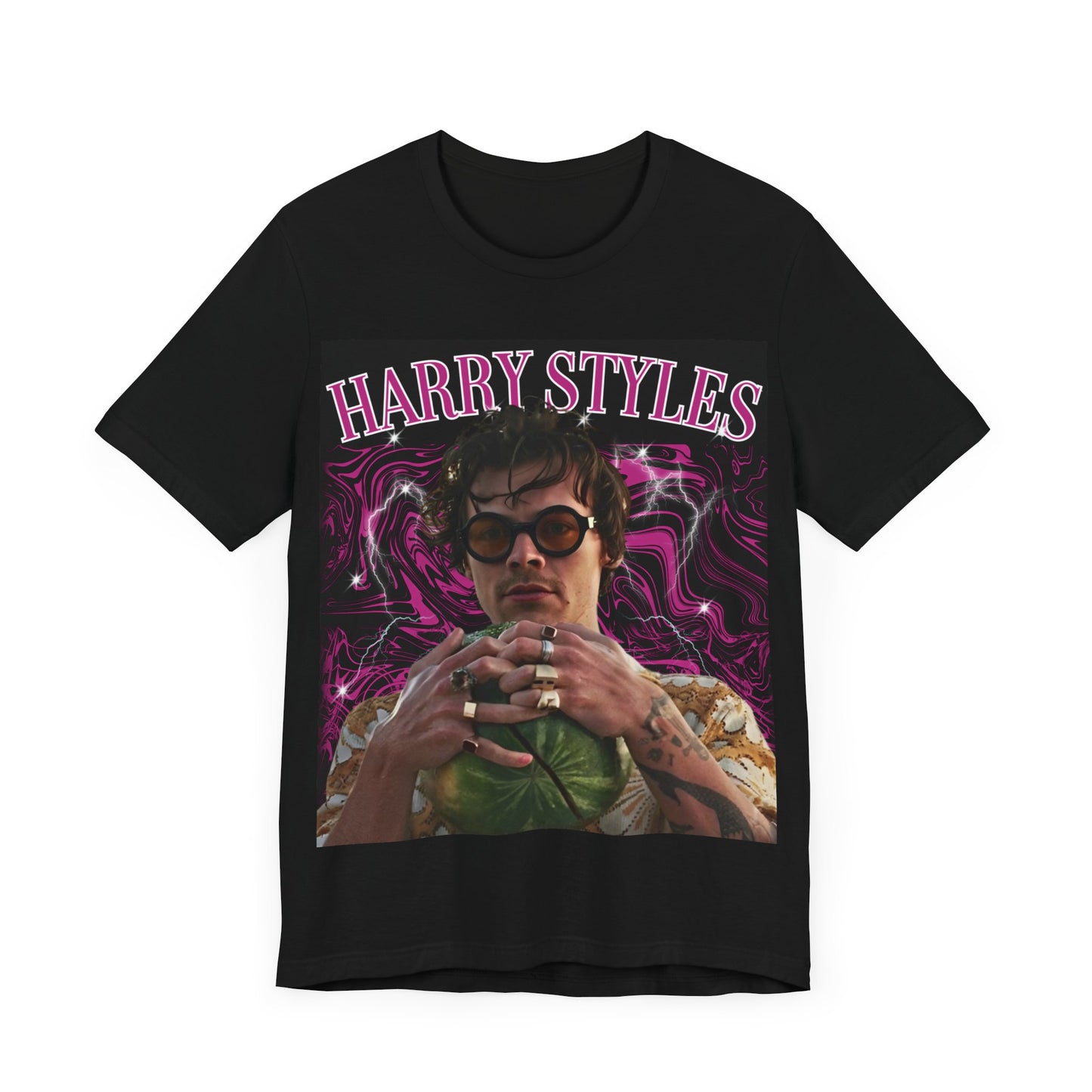 A black graphic t-shirt featuring a bootleg-style pop graphic of Harry Styles.