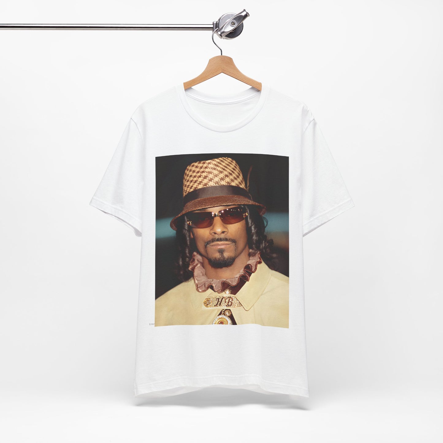 A black graphic t-shirt featuring a glamorous graphic of Snoop Dogg as a Doggfather icon.