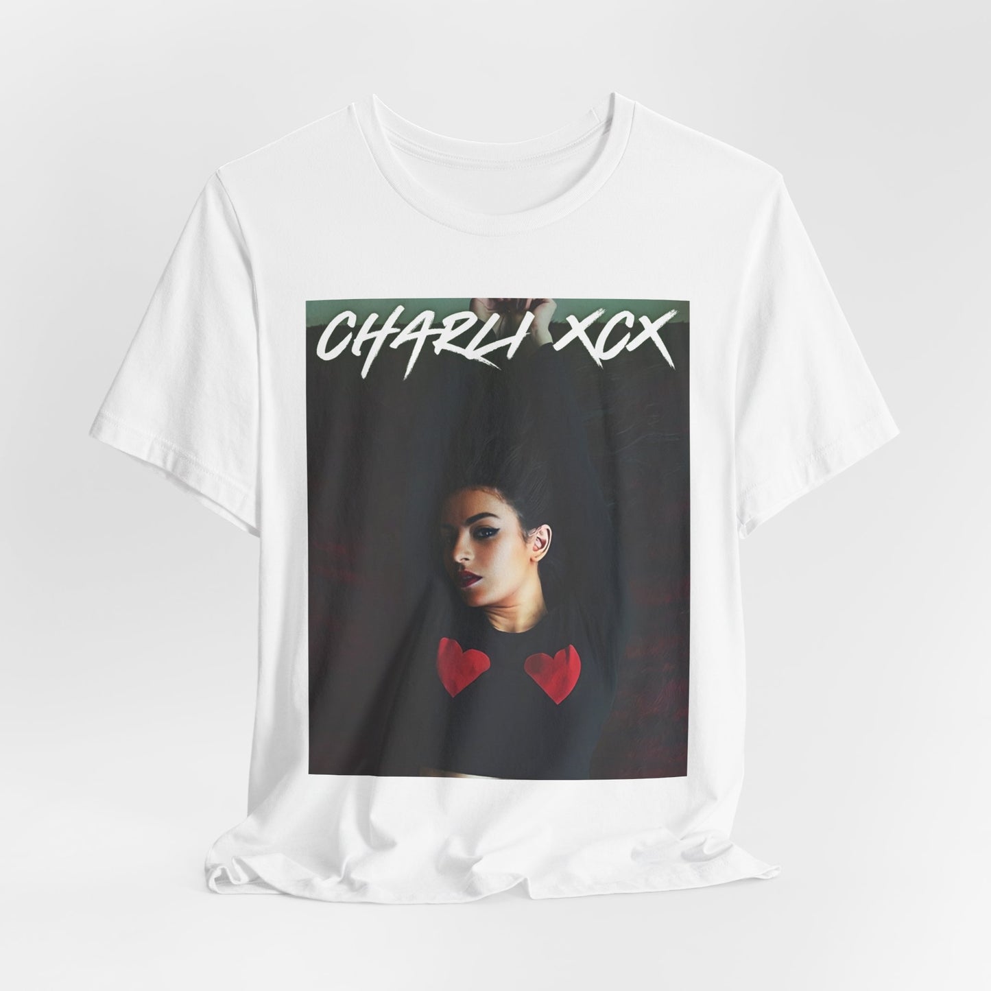 A black graphic t-shirt featuring a graphic of Charli XCX, designed with a future pop diva aesthetic.