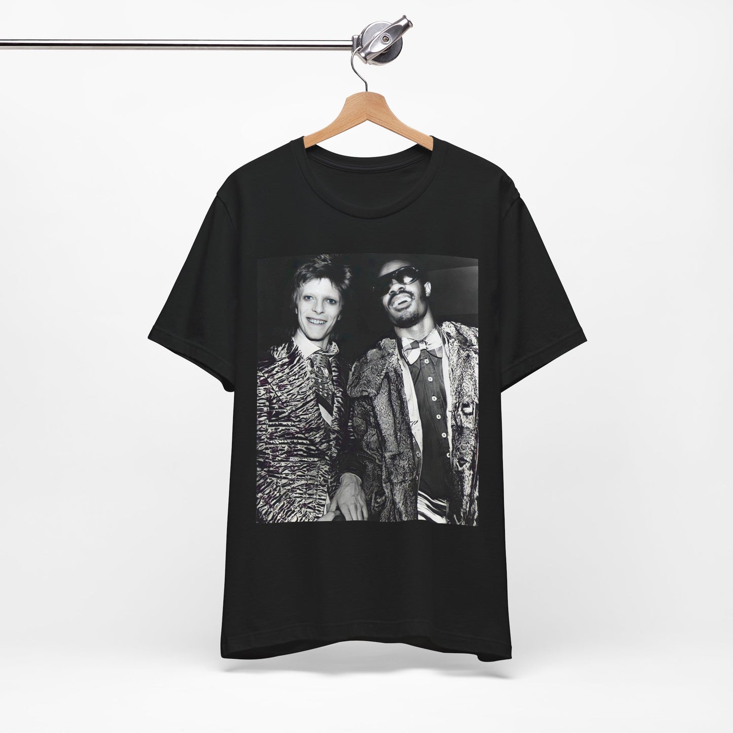 A black graphic t-shirt featuring a retro graphic of Stevie Wonder and David Bowie together.