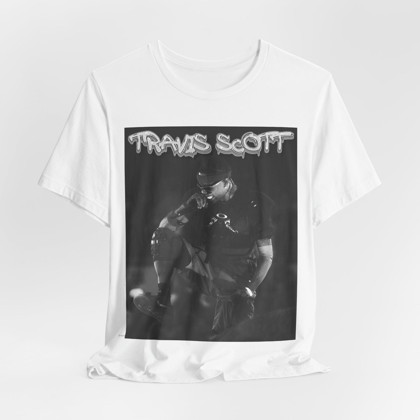 A black graphic t-shirt featuring a casual rap fan graphic of Travis Scott.
