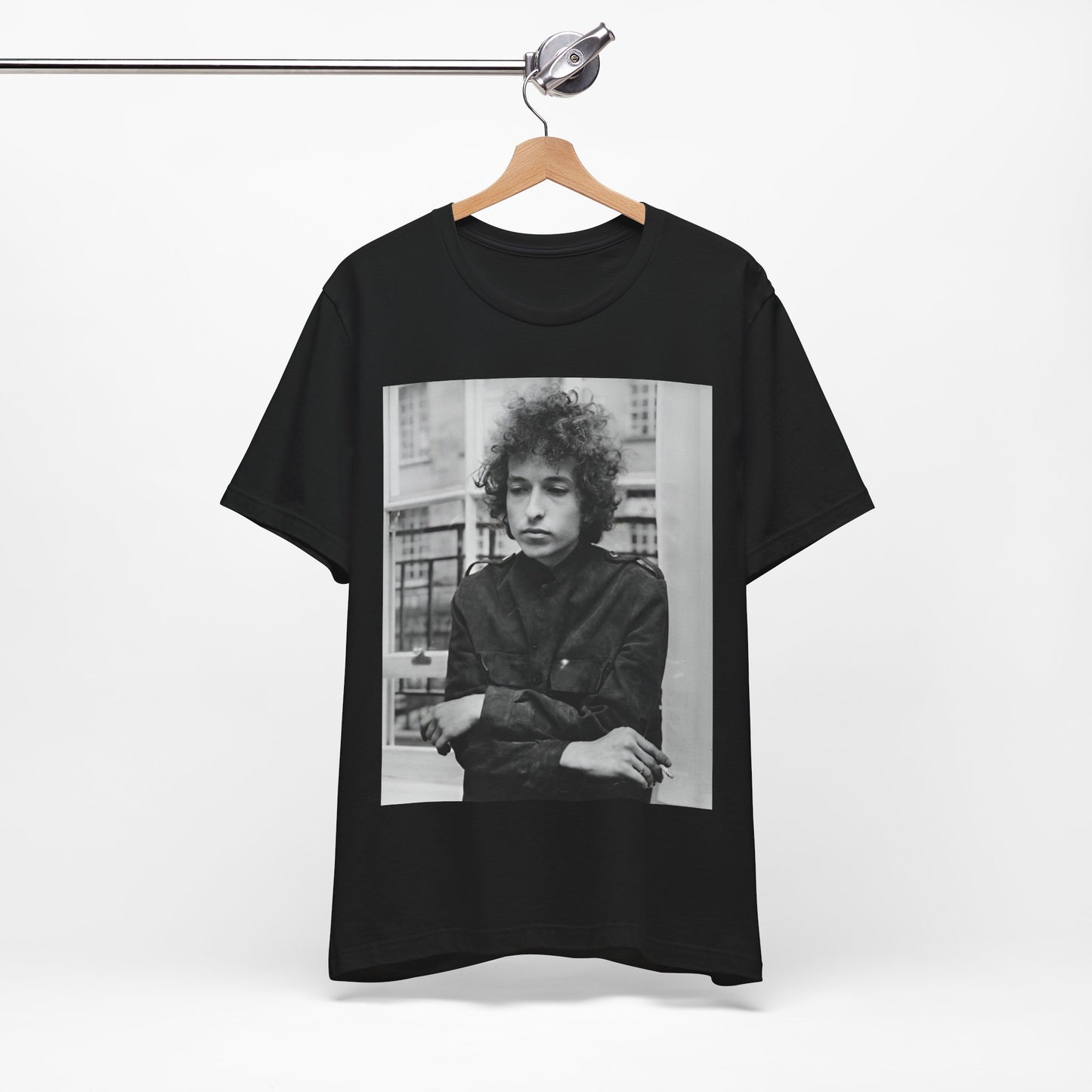 A black graphic t-shirt featuring a black and white graphic of Bob Dylan from the folk revival era.