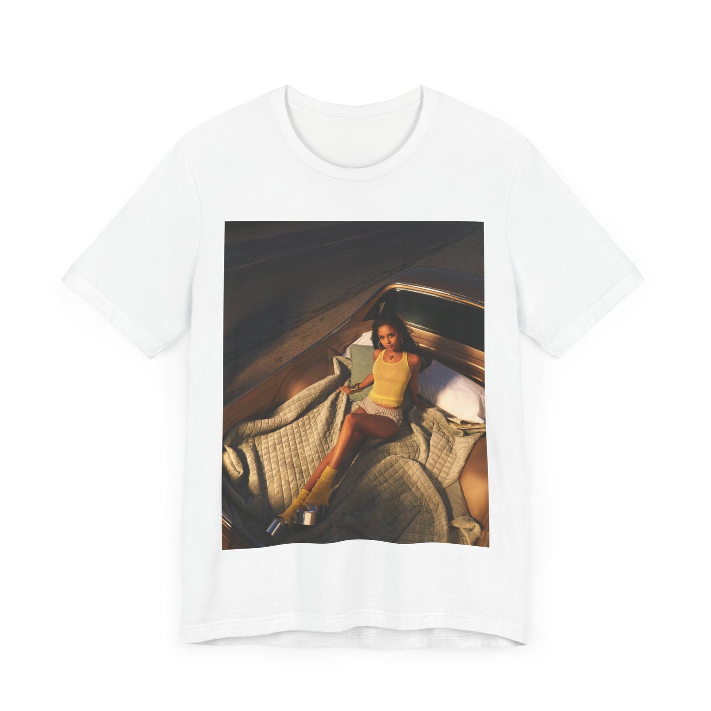 A black graphic t-shirt featuring a graphic of Tyla as an African fashion icon.