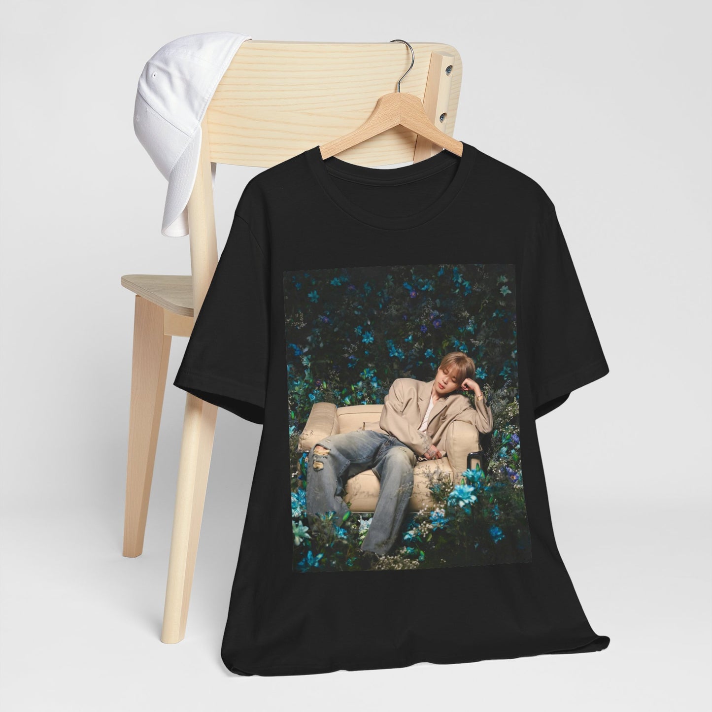 A black graphic t-shirt featuring an aesthetic graphic of Jimin in a K-Pop style.