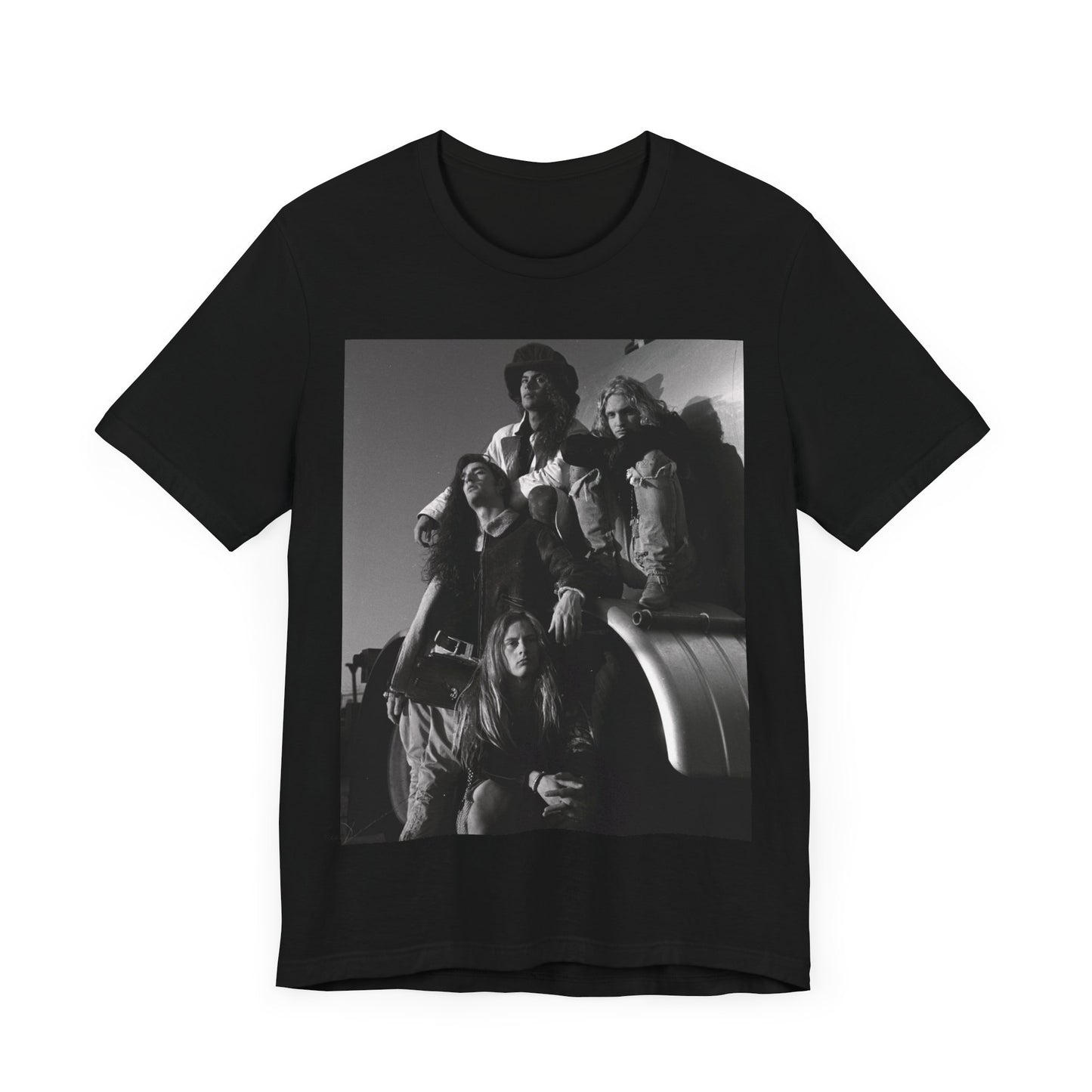 A black graphic t-shirt featuring a 90s black and white photographic portrait of the band Alice In Chains, capturing their iconic grunge look.