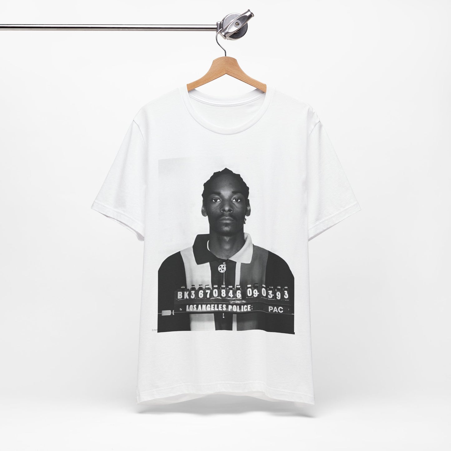 A black graphic t-shirt featuring a graphic of Snoop Dogg's mug shot.