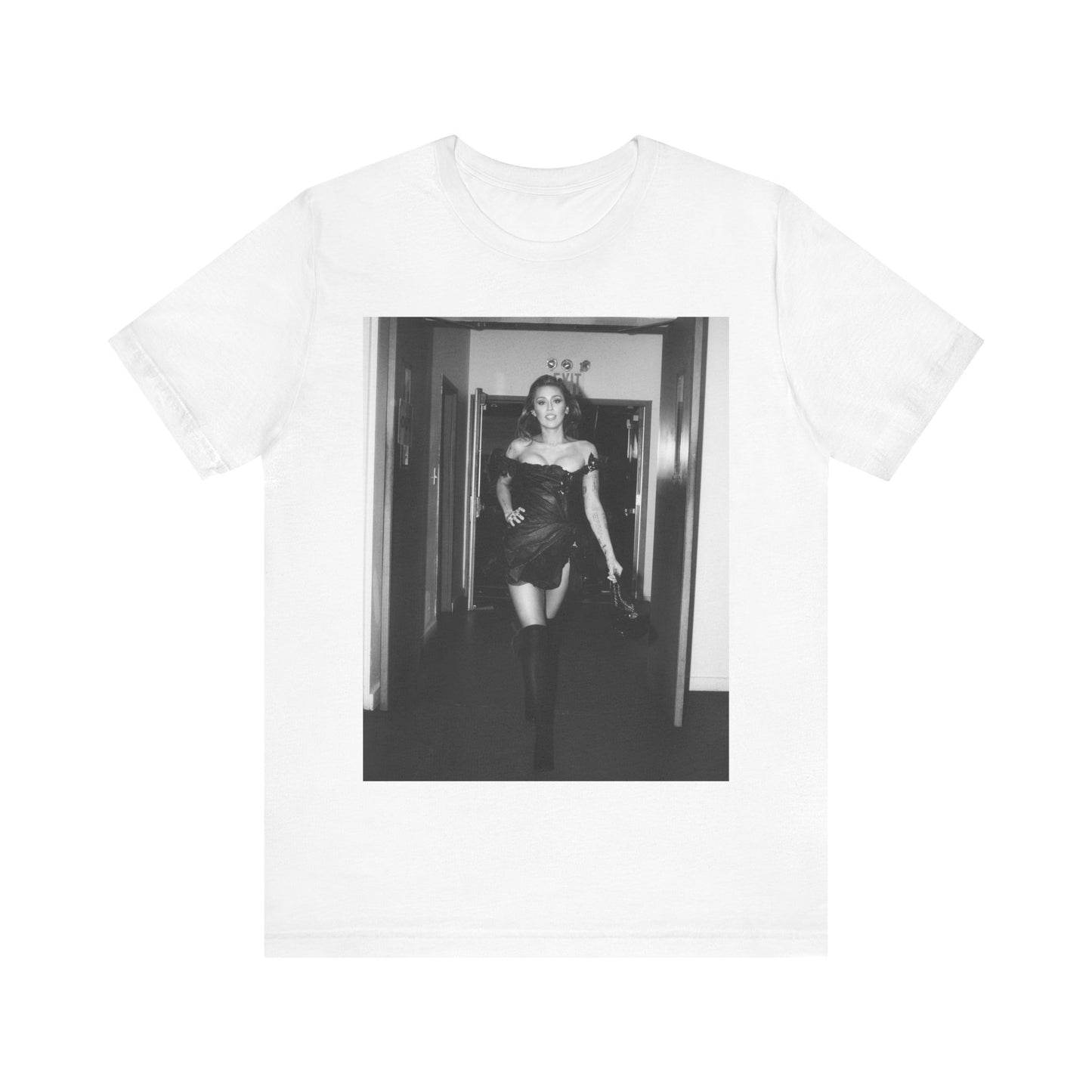 A black graphic t-shirt featuring a black and white graphic of Miley Cyrus in a cool pop rock style.