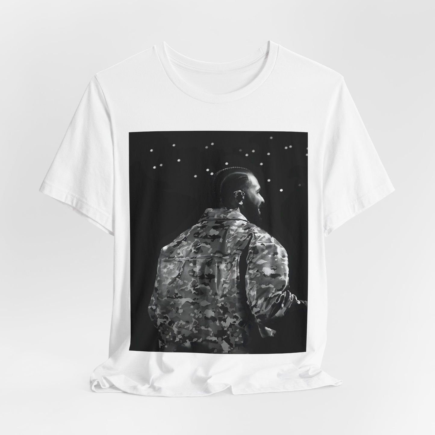 A black graphic t-shirt featuring a black and white graphic or photo of Drake performing live on stage.