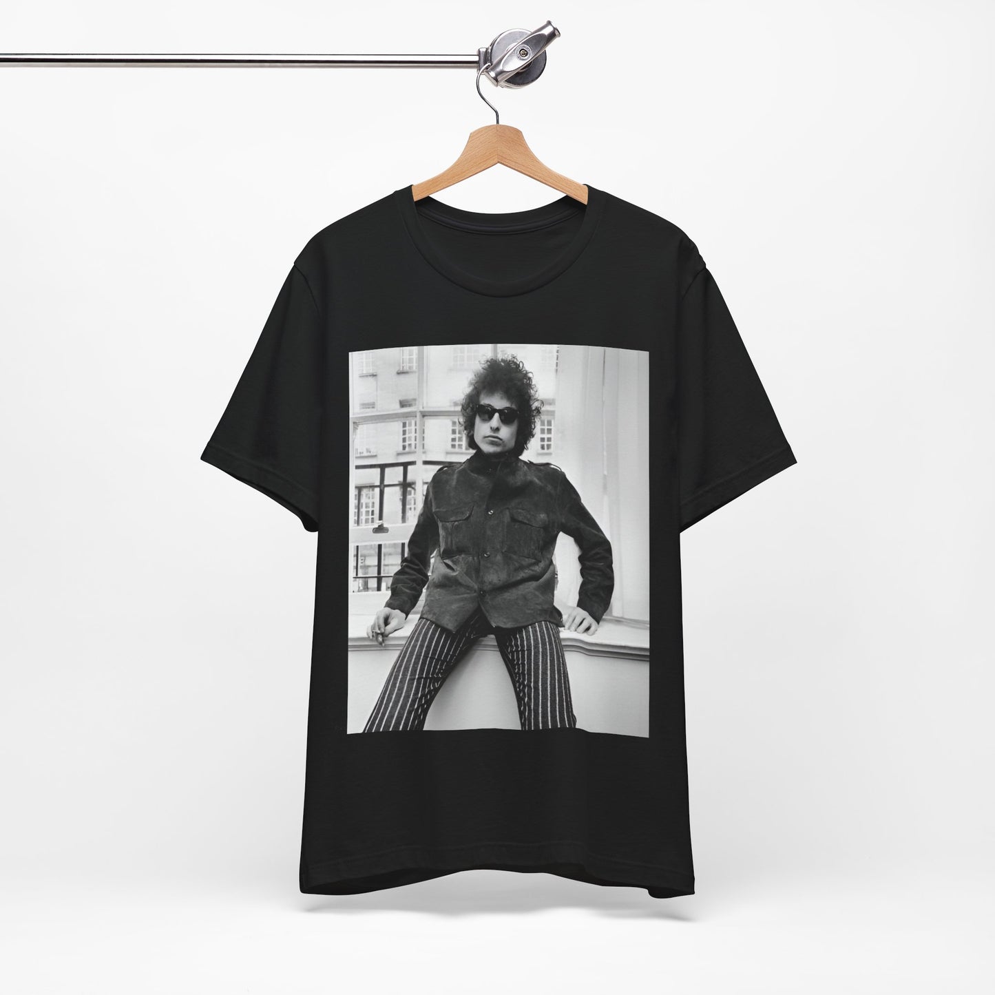A black graphic t-shirt featuring a graphic related to Bob Dylan's 'Highway 61' era, possibly with album art elements or iconic imagery.