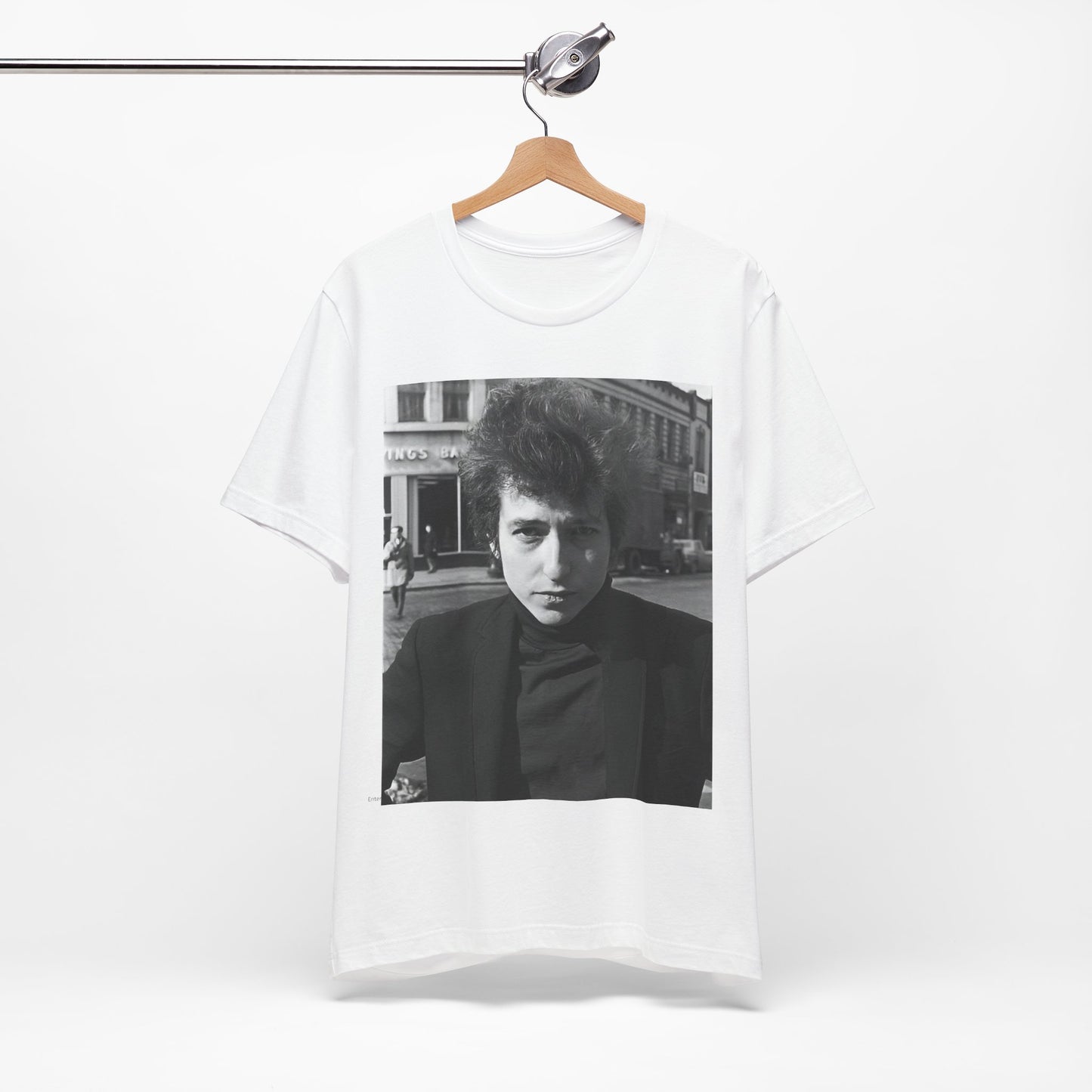 A black graphic t-shirt featuring a 60s black and white photo portrait of Bob Dylan.