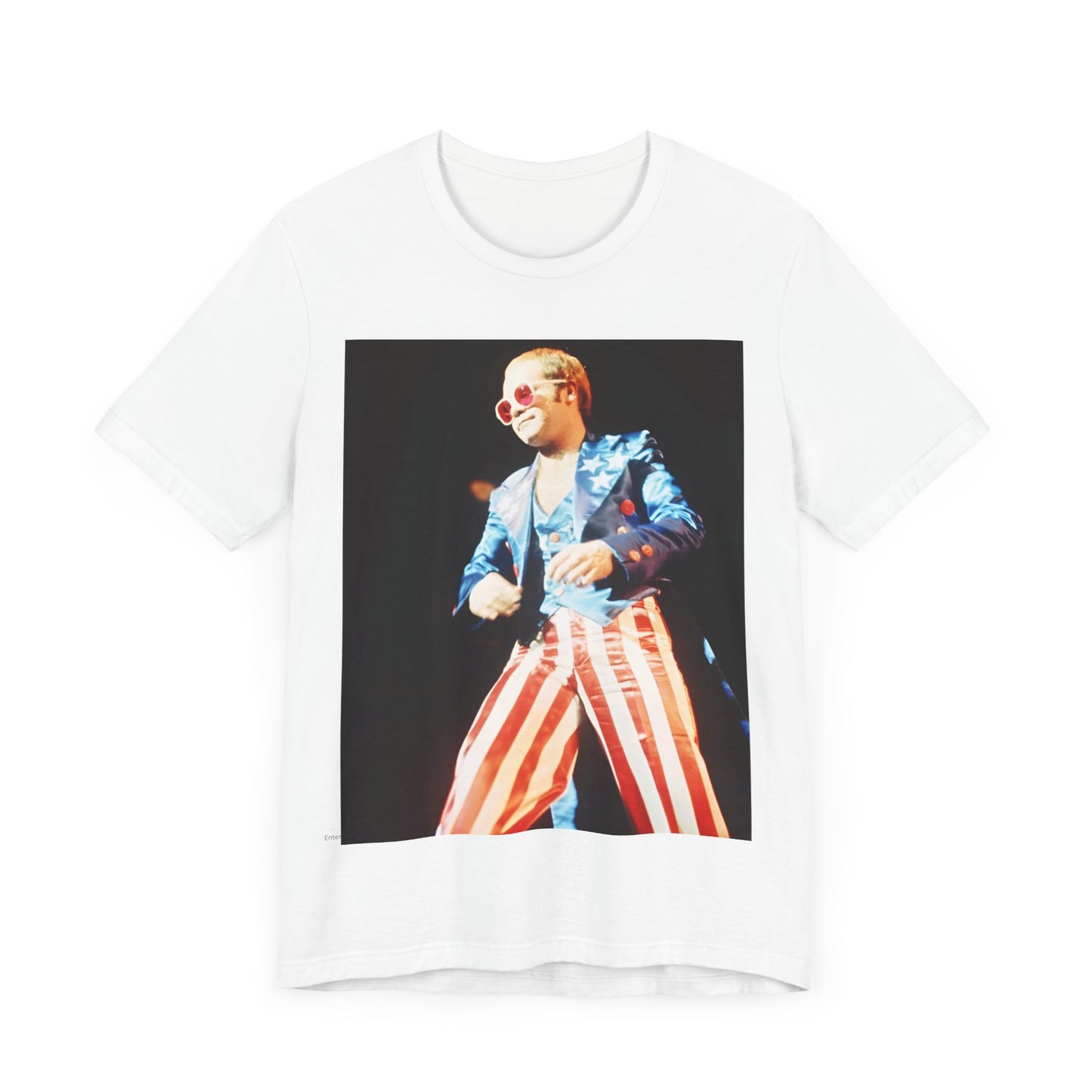 A black graphic t-shirt featuring a graphic related to Elton John's 70s America tour.