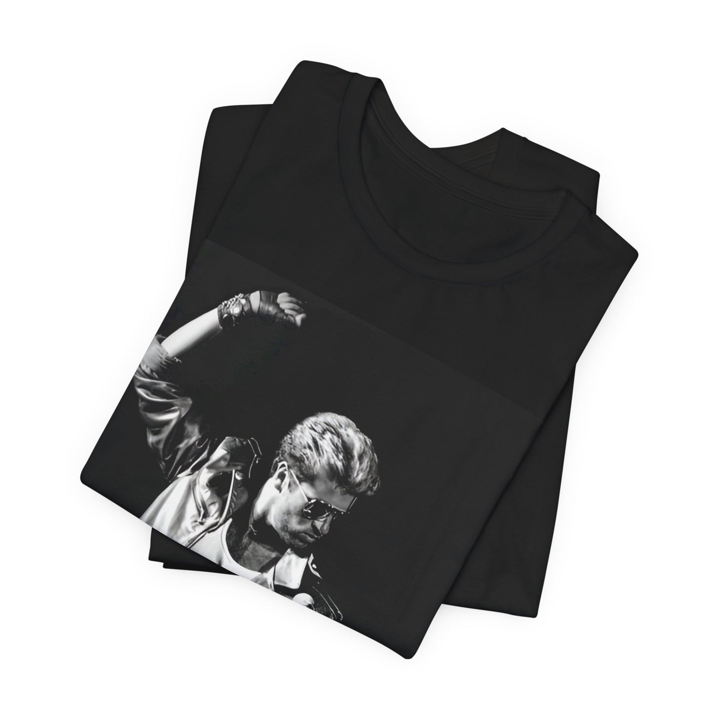 A black graphic t-shirt featuring an iconic black and white portrait photo of George Michael.