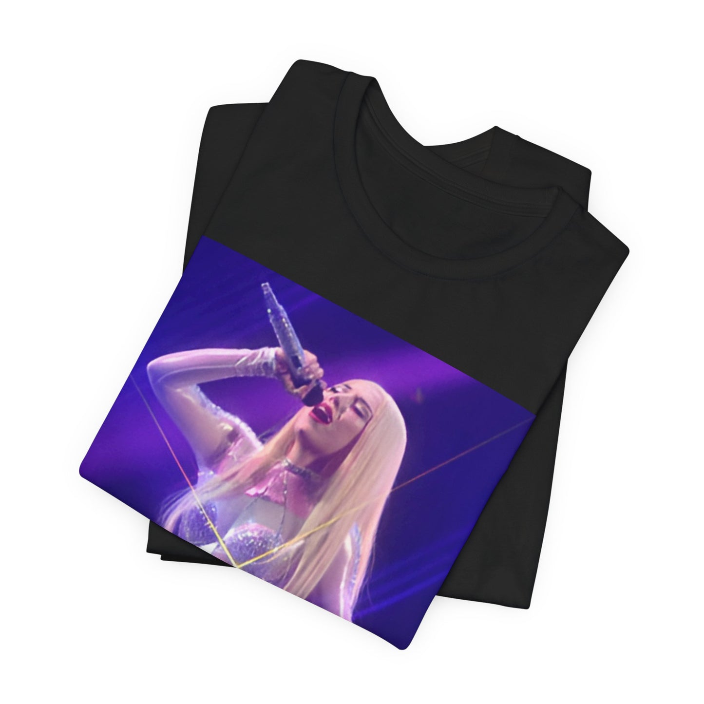 A black graphic t-shirt featuring a photo or illustration of Ava Max performing on stage, with a glittering or sparkling effect.