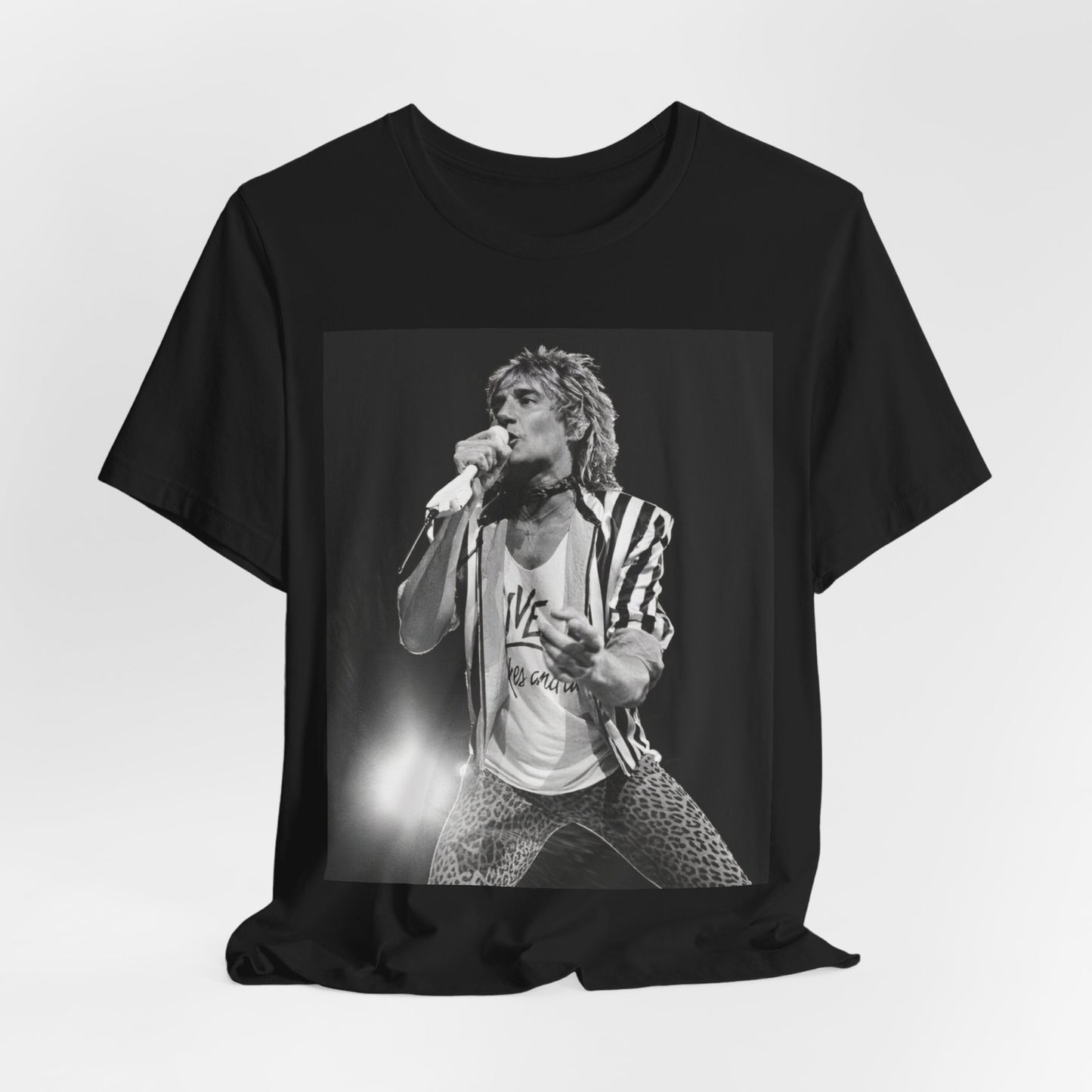 A black graphic t-shirt featuring a black and white portrait photo of Rod Stewart.