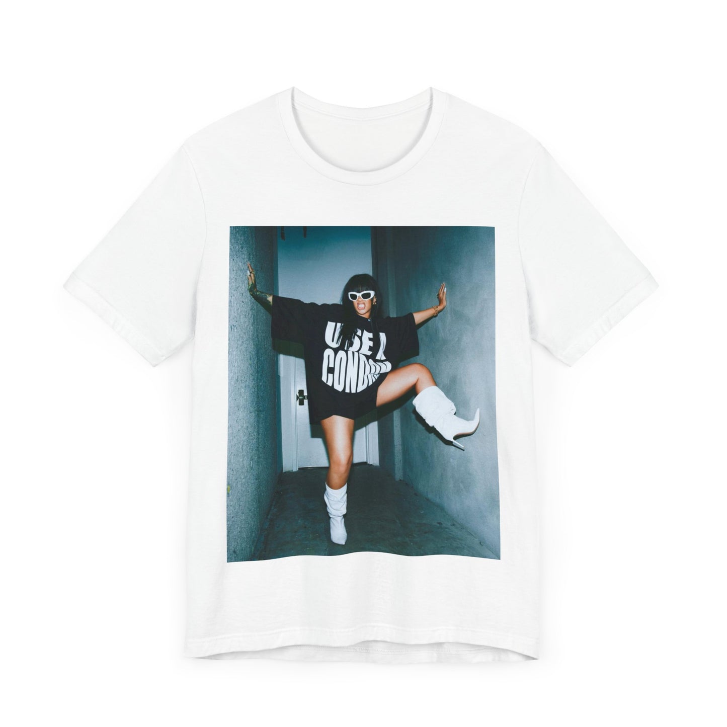 A black graphic t-shirt featuring a modern pop essential graphic of Rihanna.