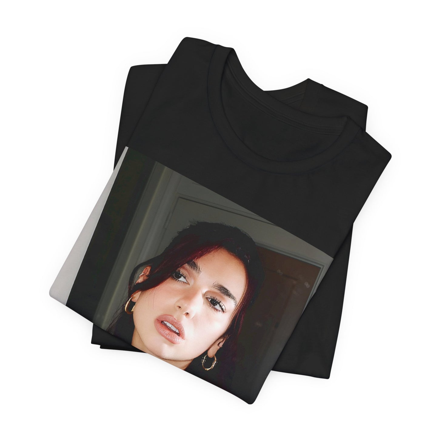 A black graphic t-shirt featuring a graphic of Dua Lipa, possibly with Parisian elements or a 'Paris' theme.