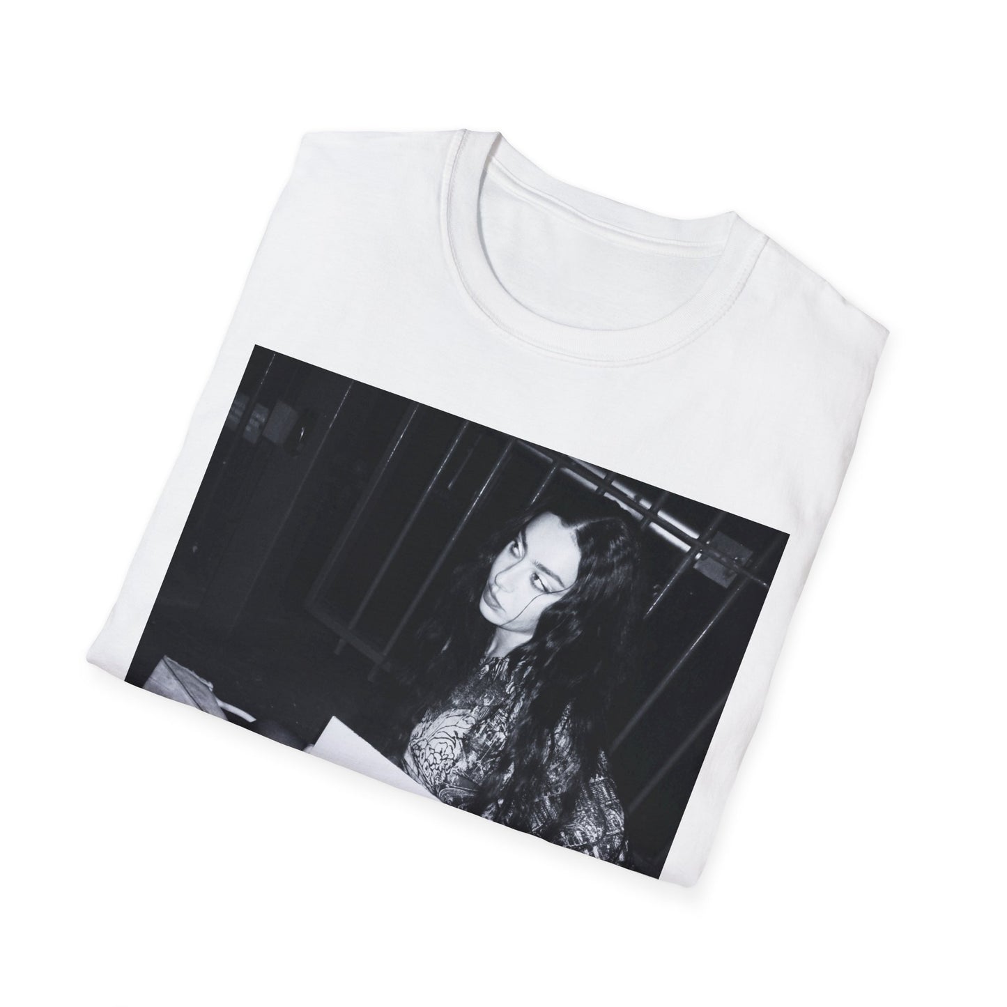 A black graphic t-shirt featuring a graphic related to Charli XCX's 'Brat' album.