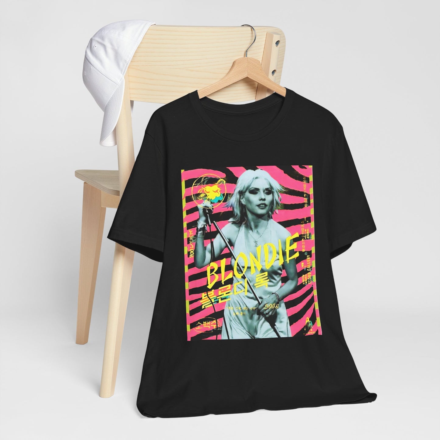 A black graphic t-shirt featuring a retro 70s pop art style graphic of Blondie.