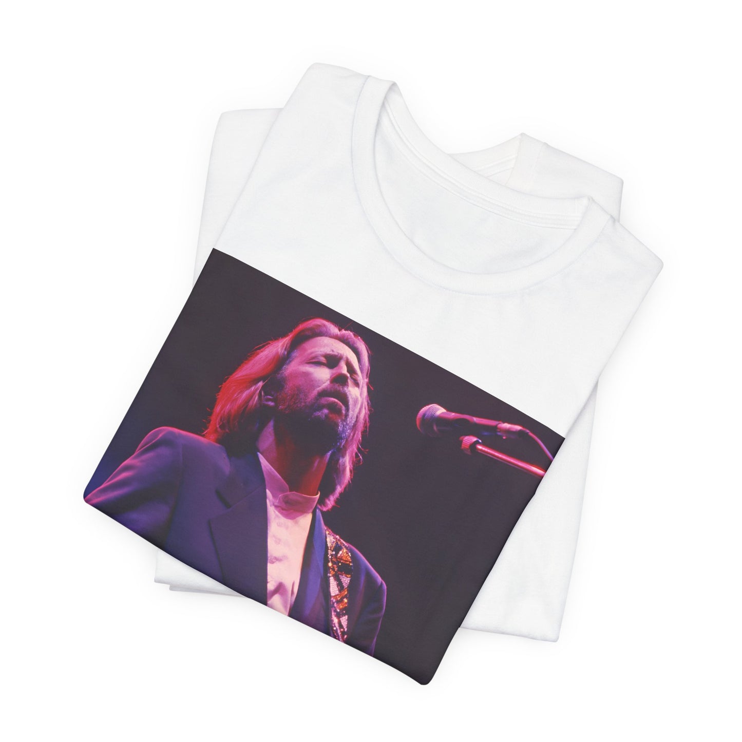 A black graphic t-shirt featuring a vintage graphic of Eric Clapton as a blues rock icon.