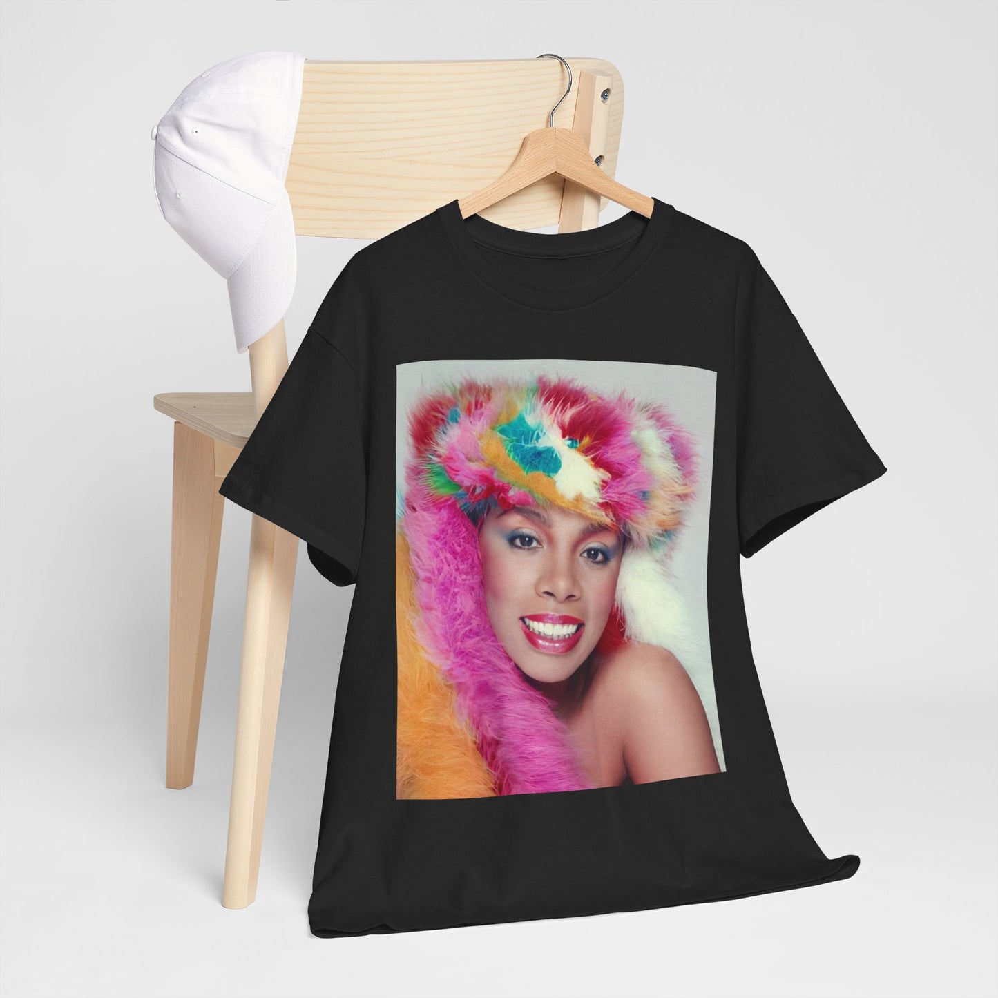 A black graphic t-shirt featuring a 70s disco pop graphic of Donna Summer.