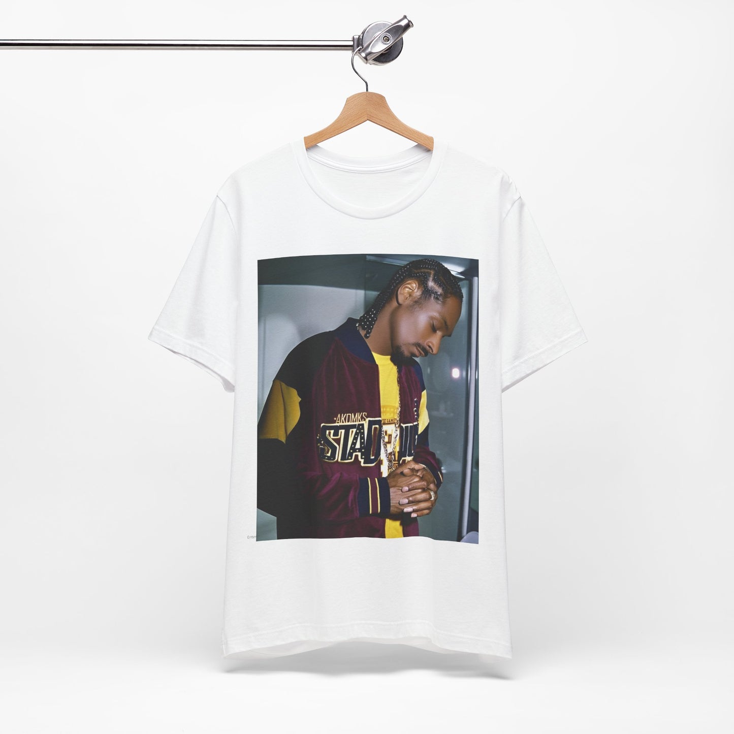 A black graphic t-shirt featuring a classic graphic of Snoop Dogg with a cool gaze.
