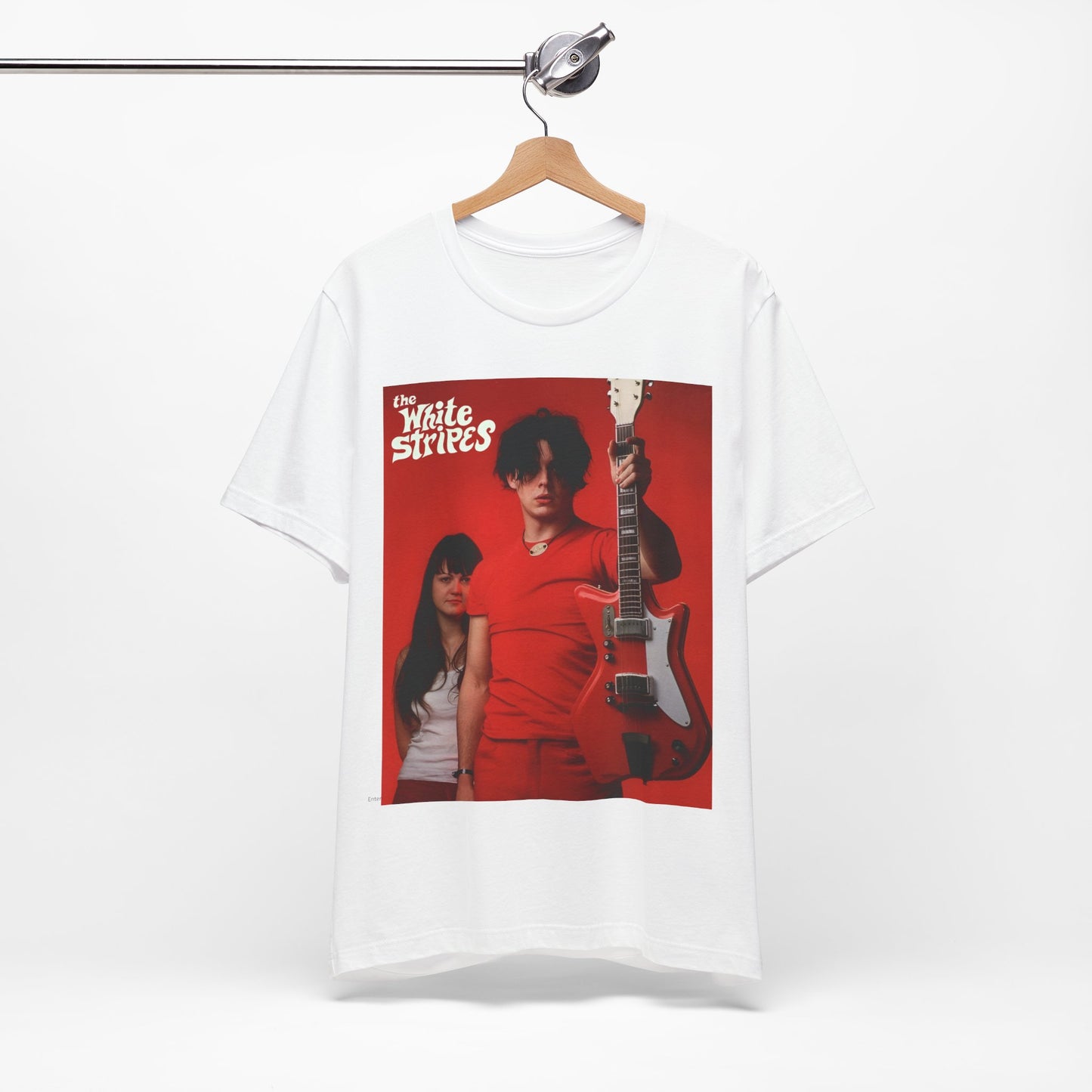A black graphic t-shirt featuring a vintage garage rock graphic of The White Stripes.