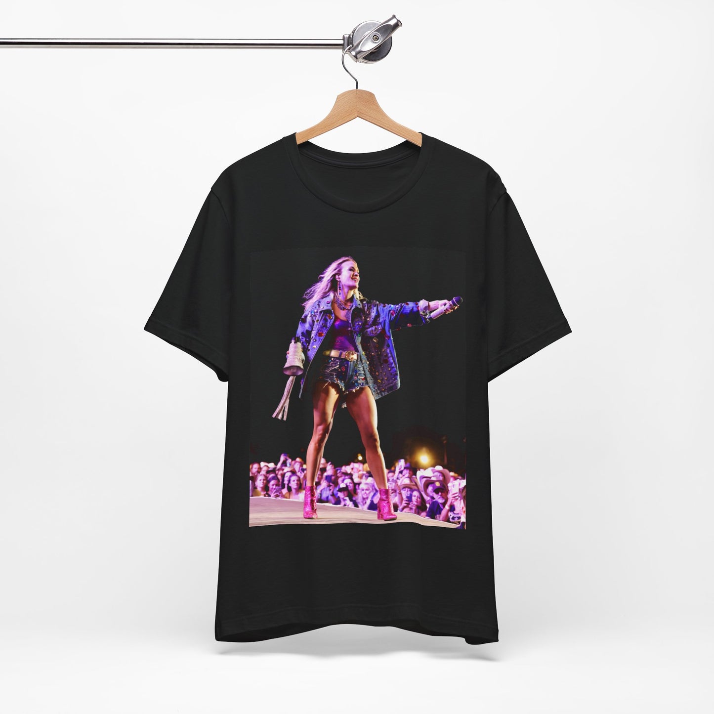 A black graphic t-shirt featuring a graphic of Carrie Underwood with Nashville-themed elements or skyline.