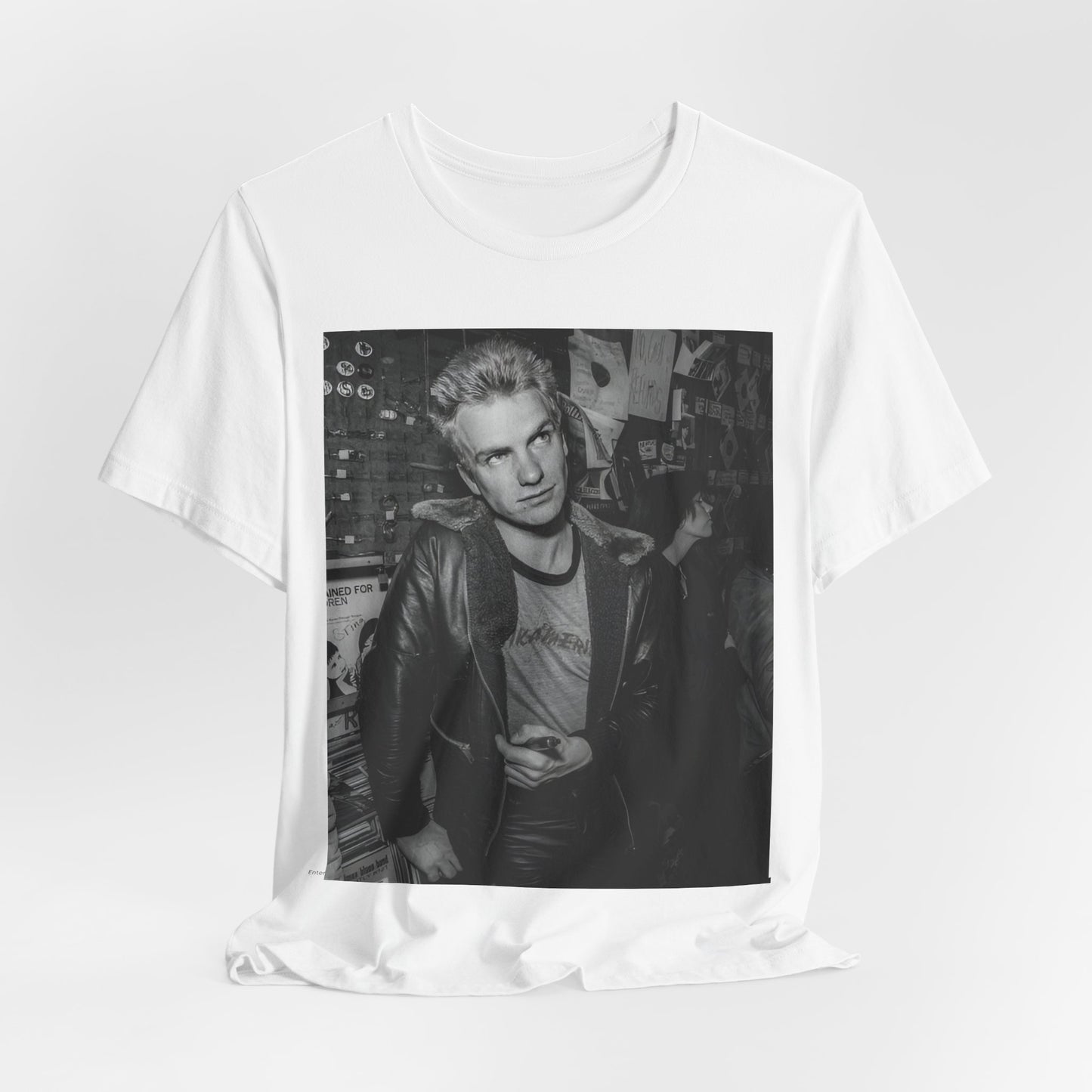 A black graphic t-shirt featuring a vintage black and white monochrome graphic or photo of Sting.