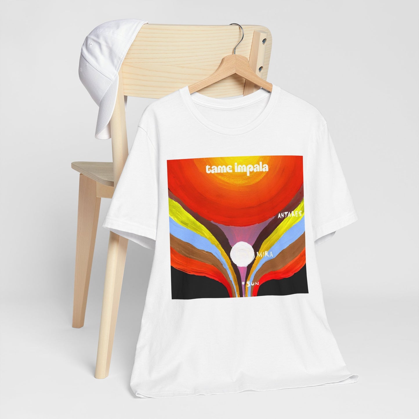 A black graphic t-shirt featuring a graphic inspired by Tame Impala's albums.
