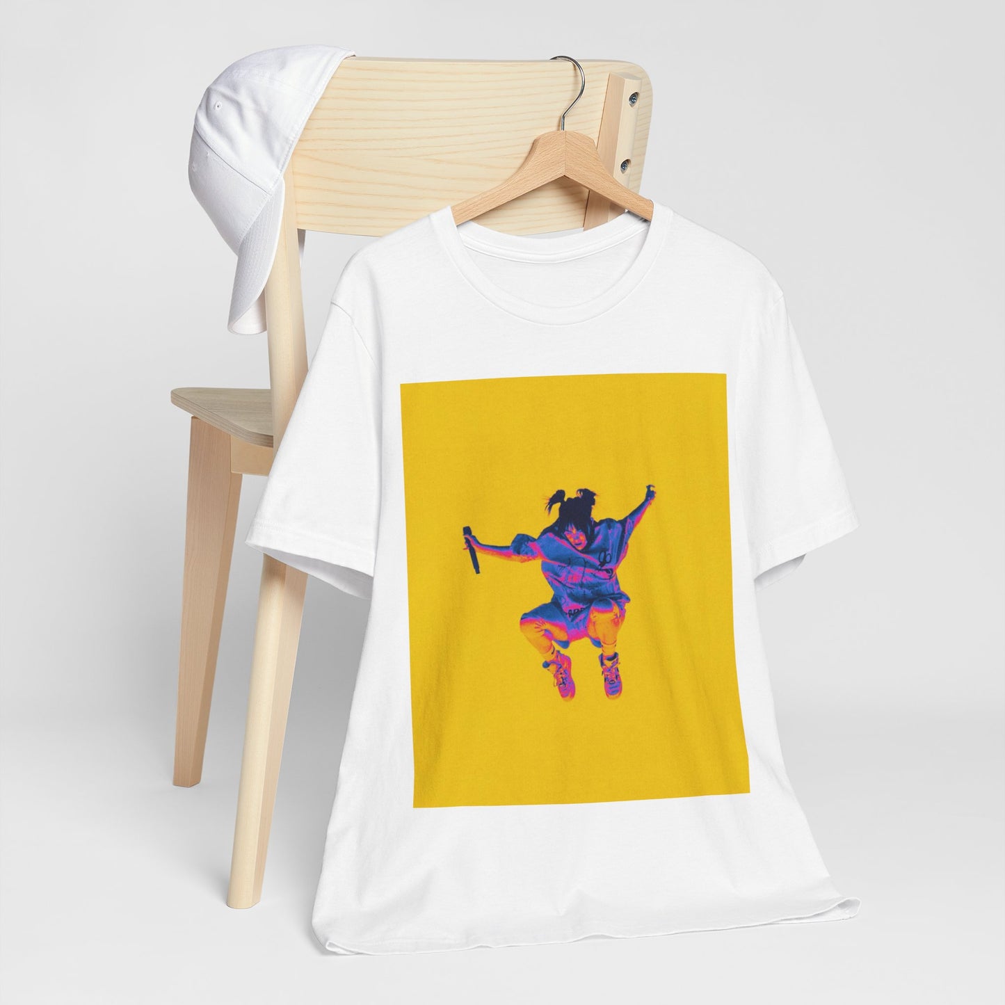 A stylized graphic of Billie Eilish jumping in the air with a microphone, rendered with psychedelic thermal colors against a solid yellow background.
